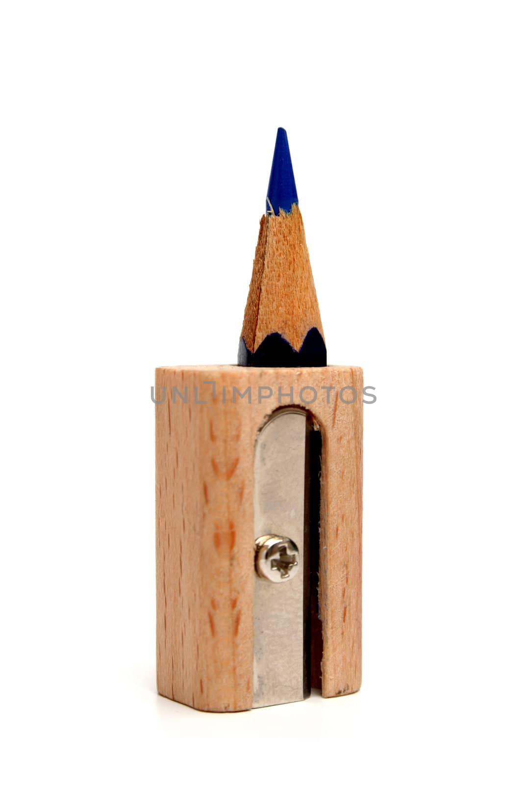 The rests of a pencil inside of a sharpener for pencils which stands vertically