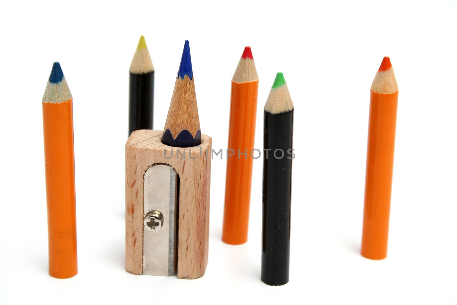 color pencils around of a unusual sharpener  by parrus
