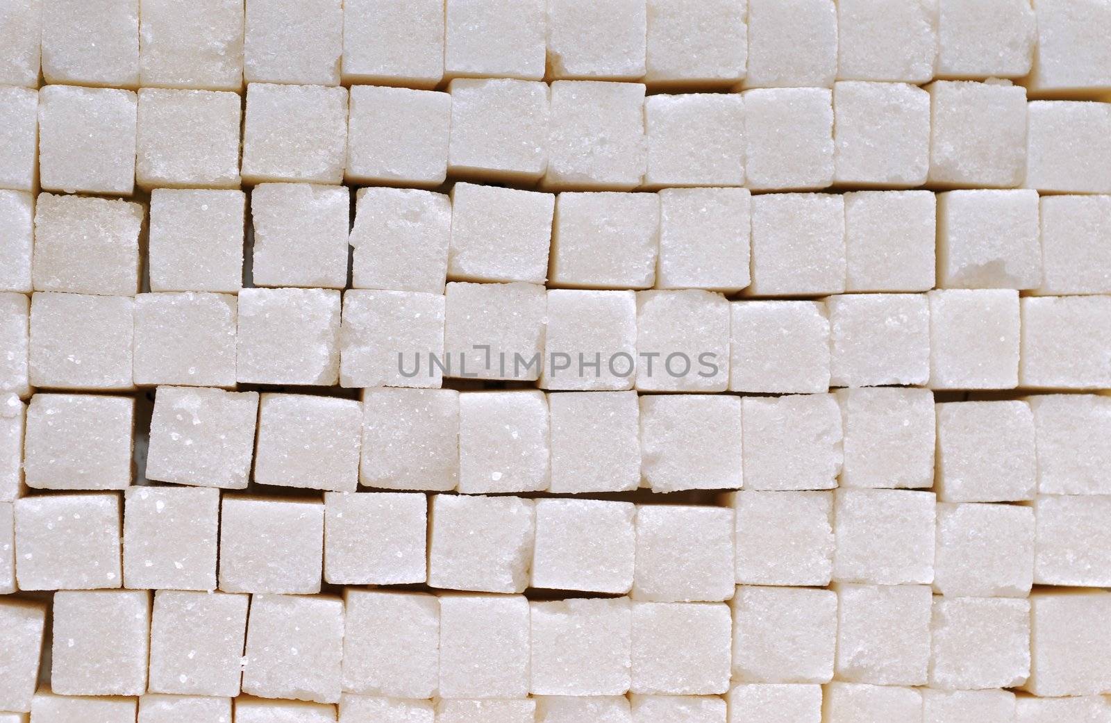White sugar cubes background with studio light 