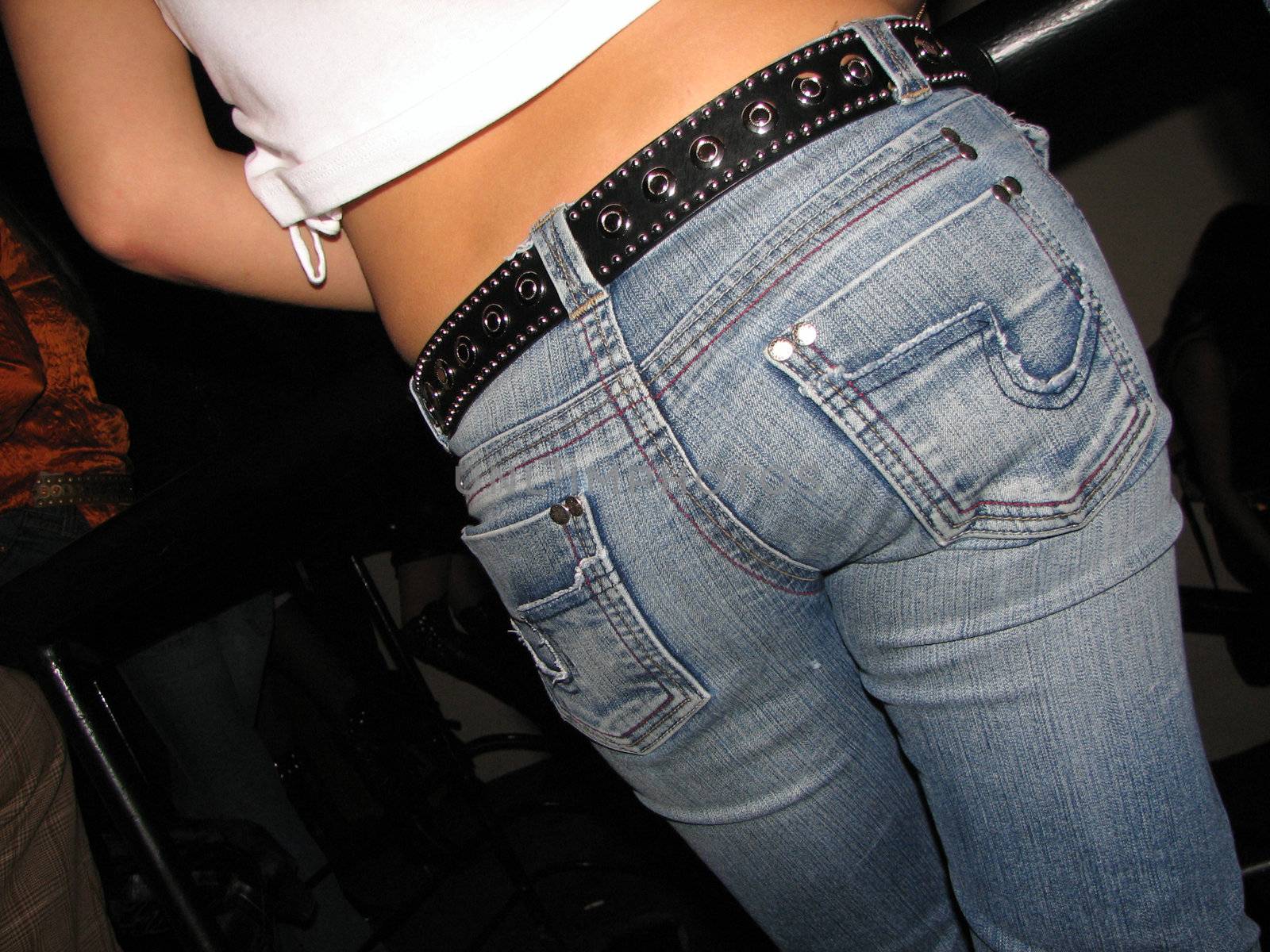 Rump attractive young girl in blue jeans