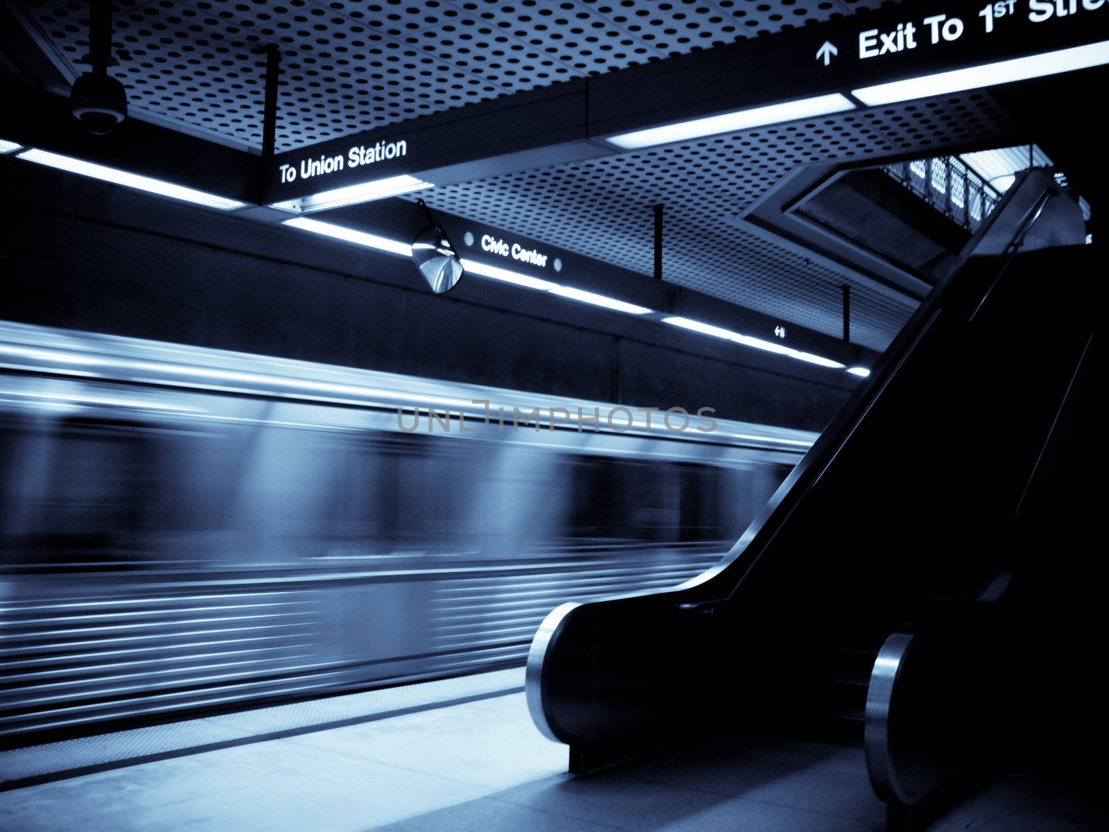 Train departing from Los Angeles metro selenium tones