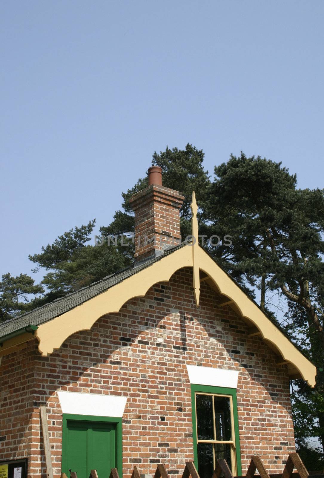 shaped wooden edging of the end of a roof gable