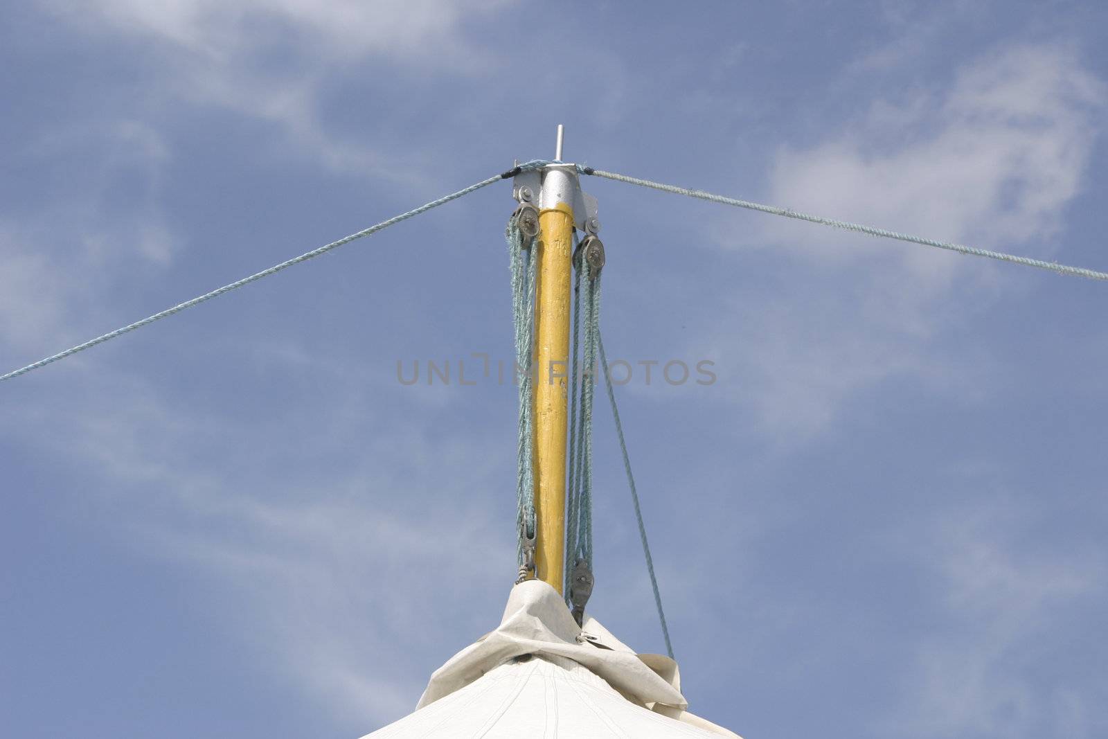 marquee pole support fastened with wire guides 