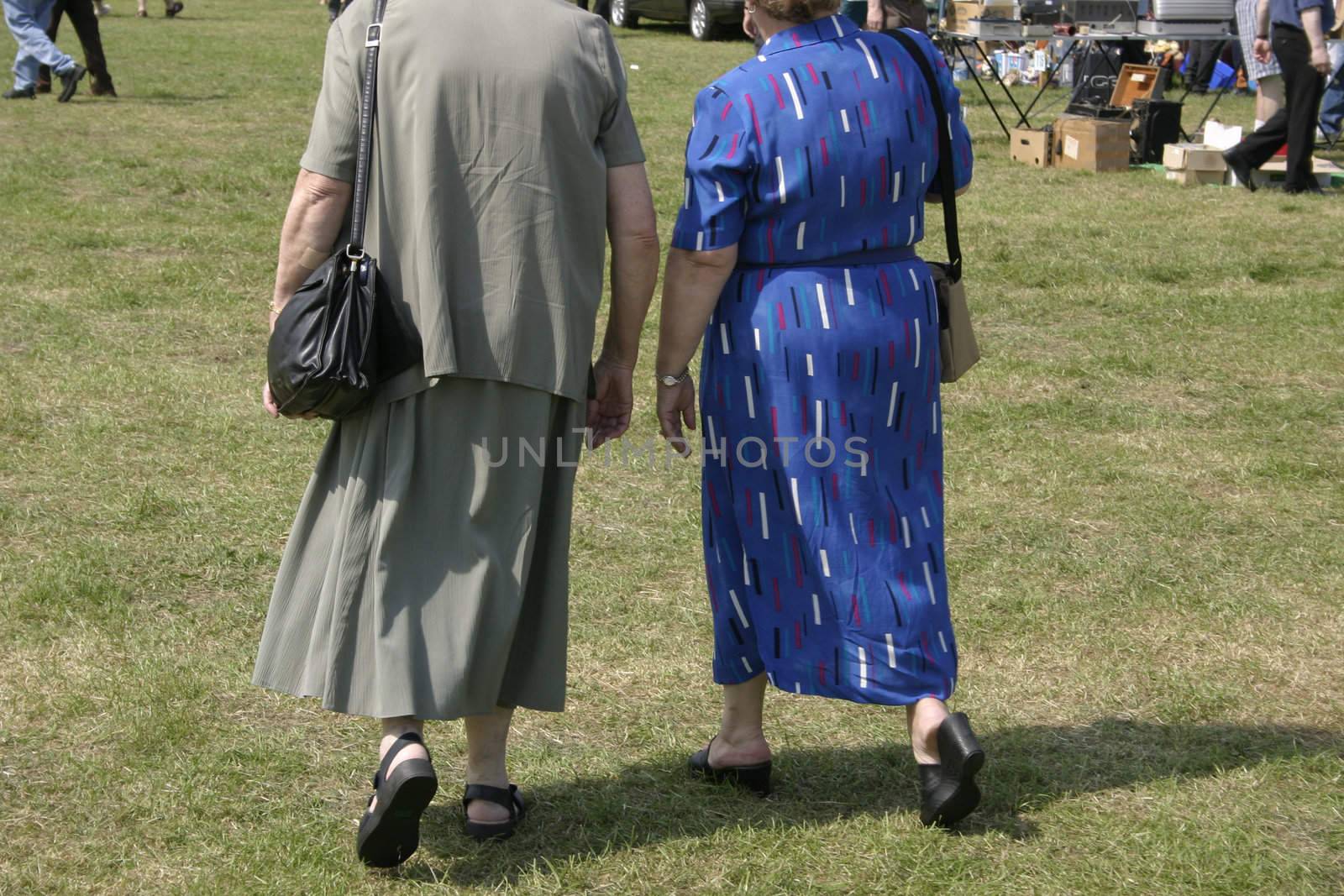 two women walking together
