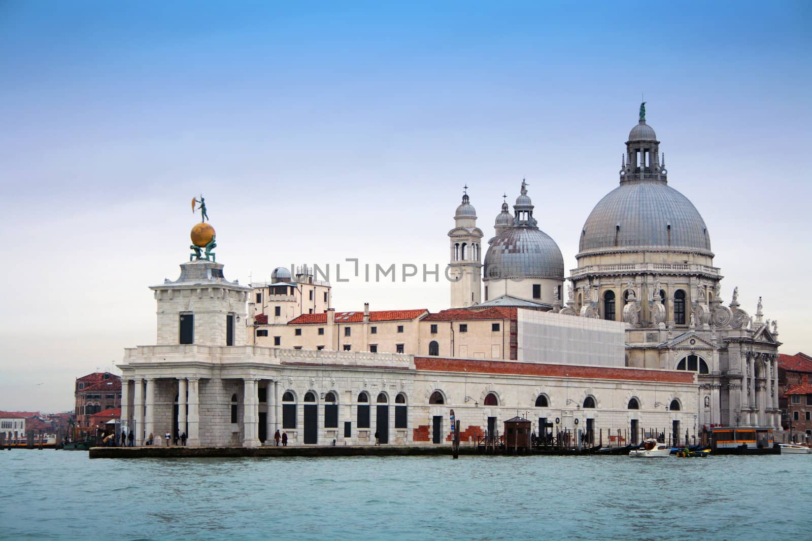 Basilica della Salute and Punta della Dogana, a thin triangular area, between Canal Grande and Canale della Giudecca, near San Marco, in Venice, Italy