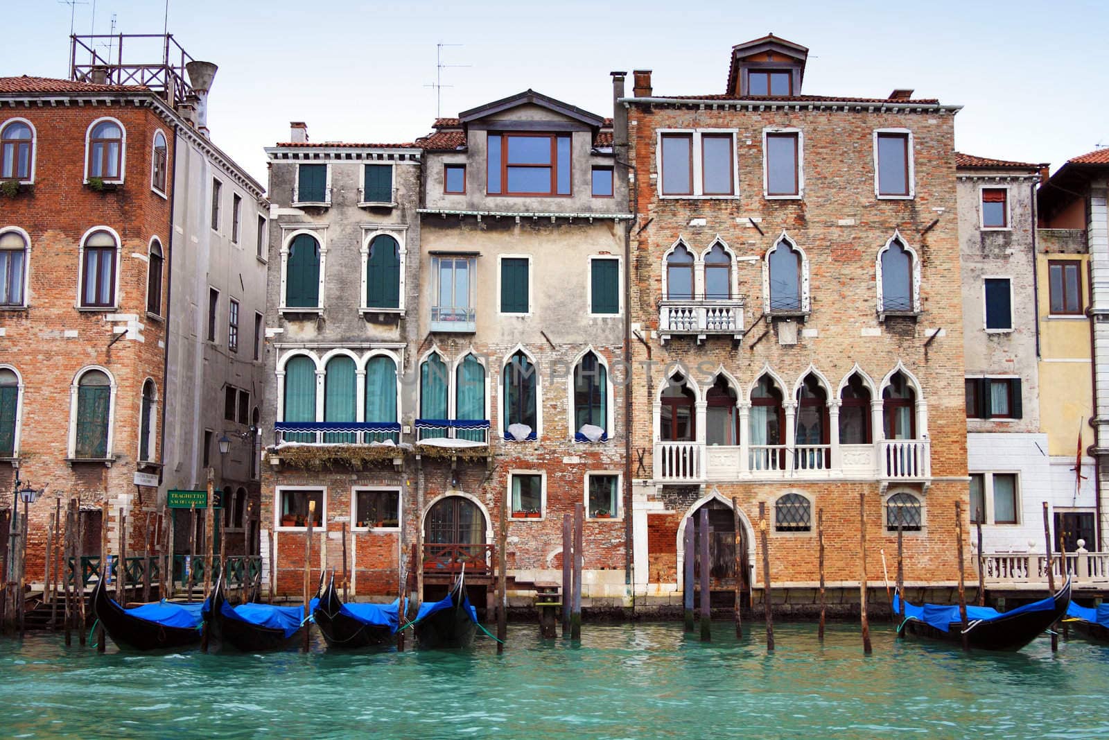 Venetian buildings and gondolas along Canal Grande, Venice, italy