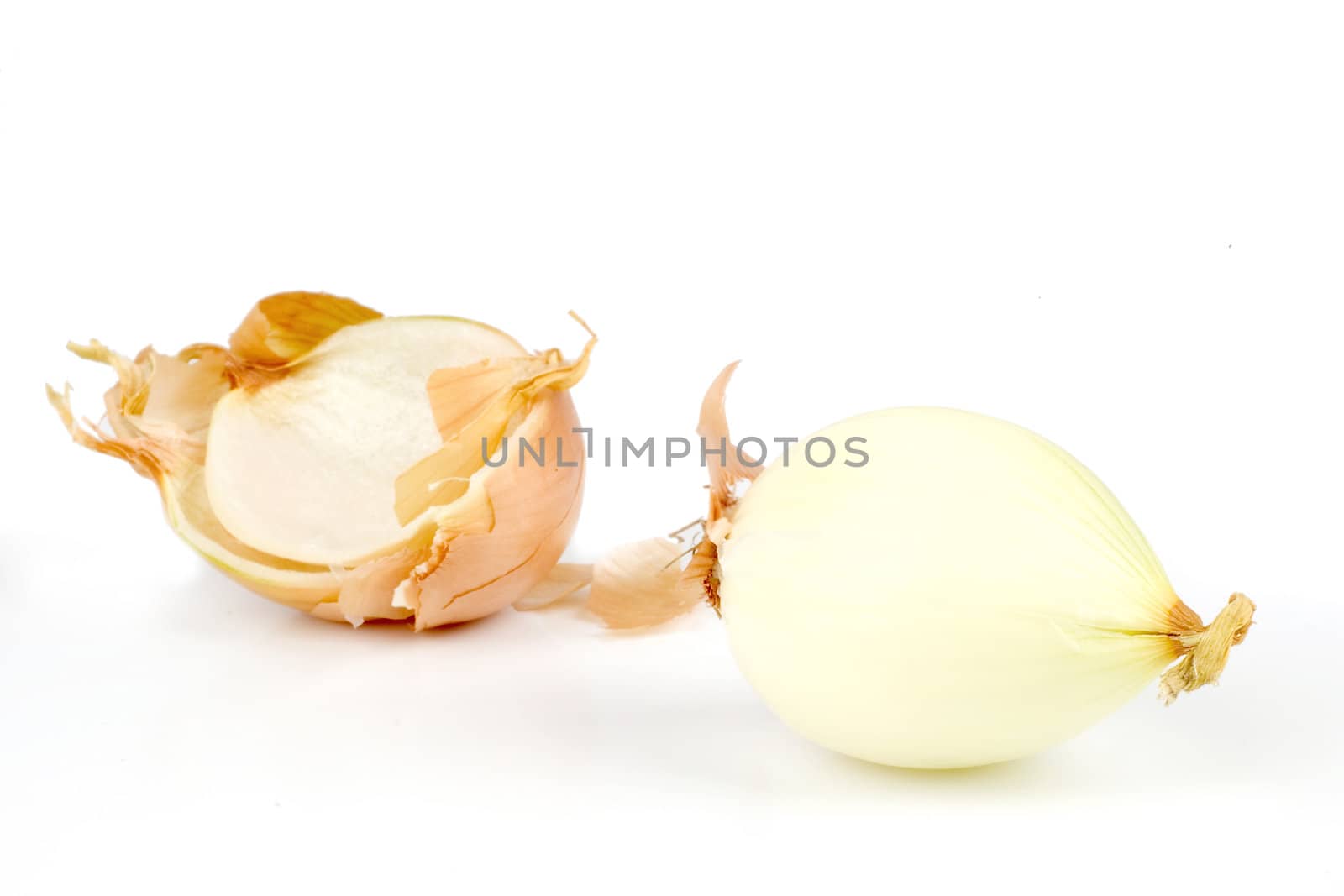 an peeled onion, isolated on a white background