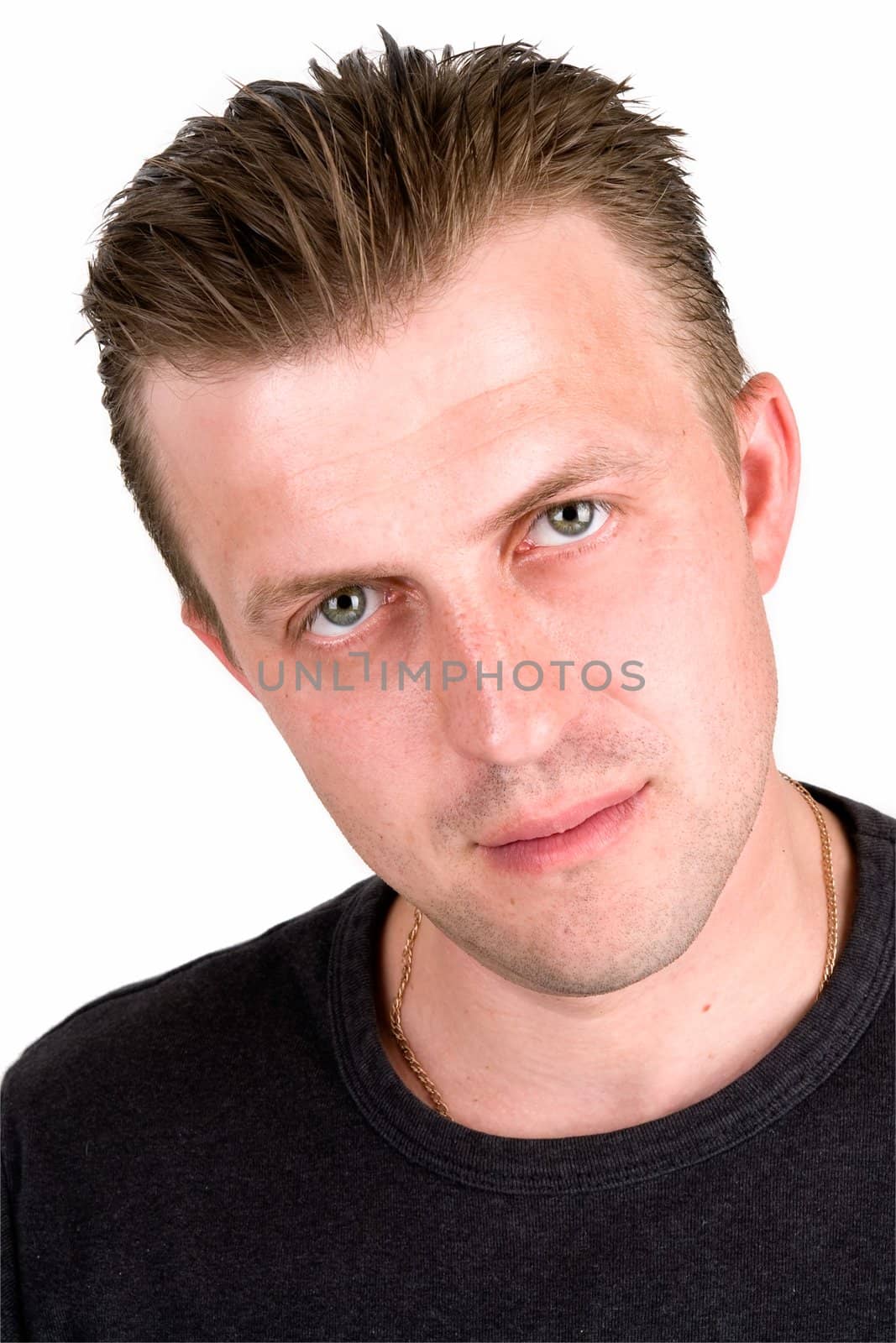The serious young man close up.