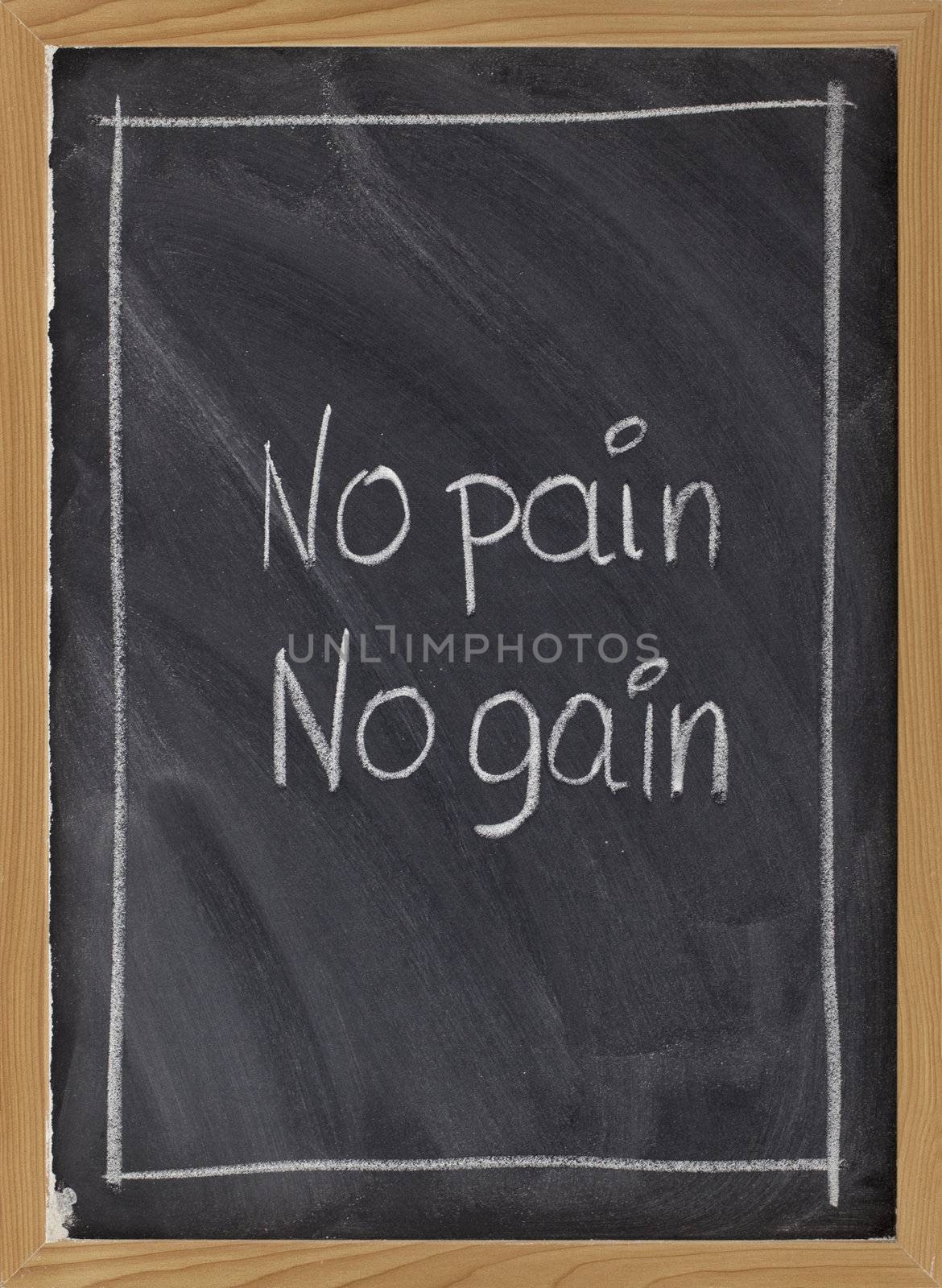 no pain, no gain exercise motto on blackboard by PixelsAway