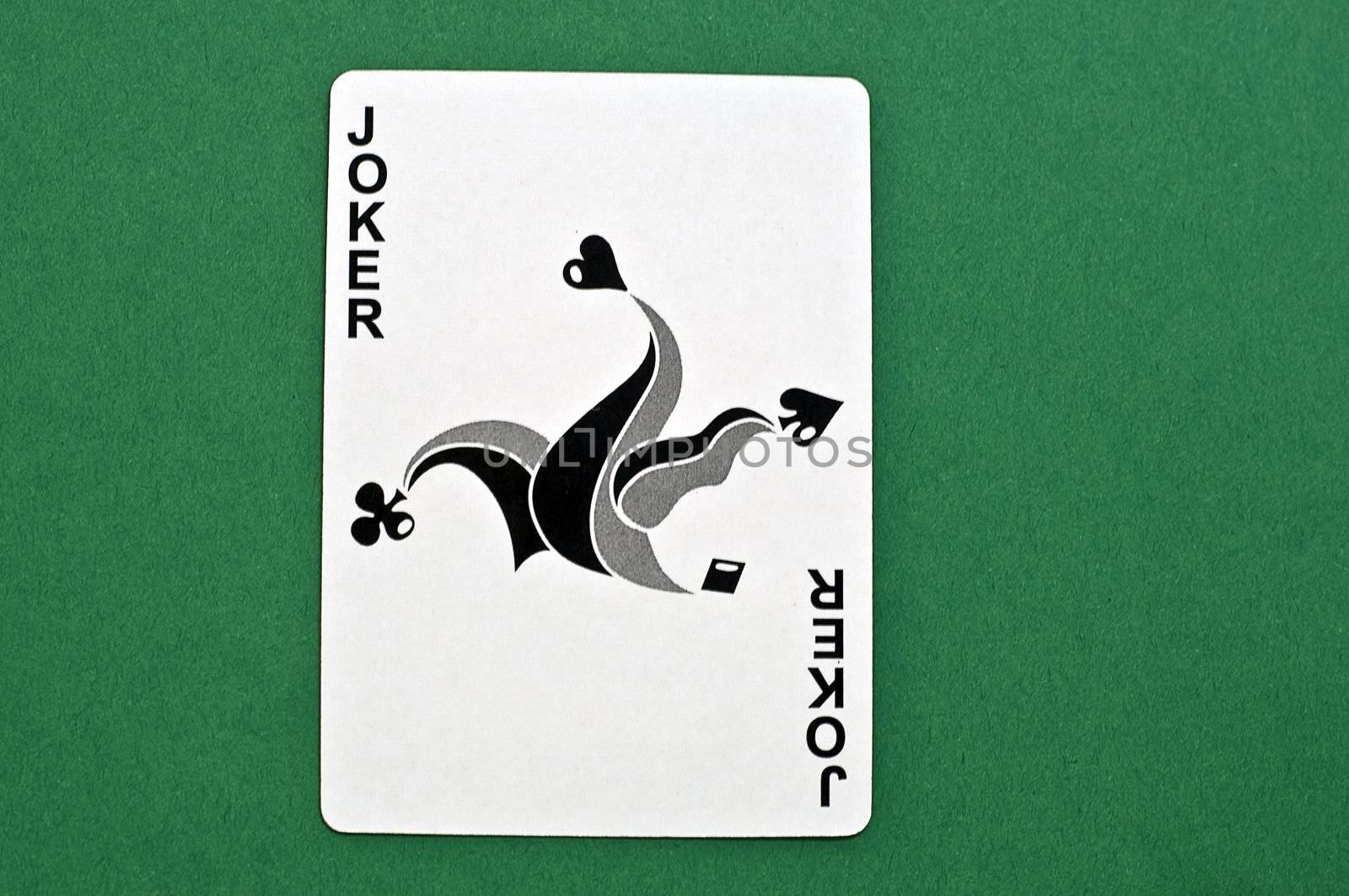 wild card in black and white on green background