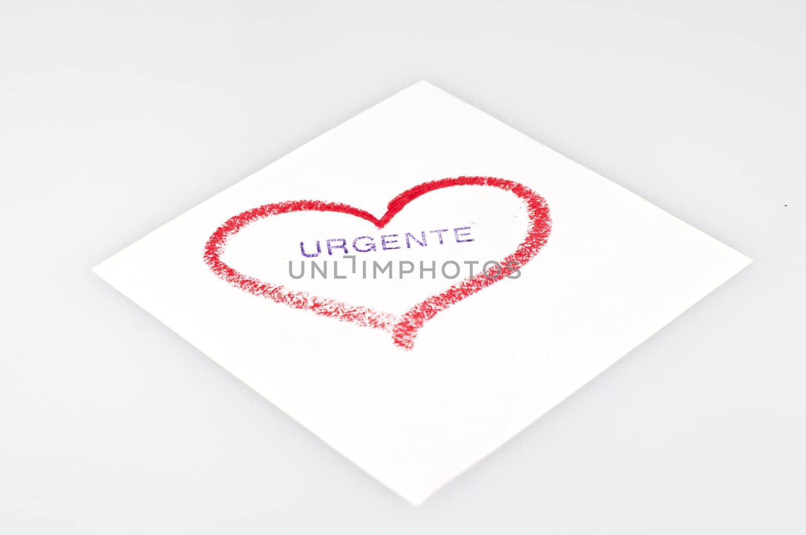 heart drawn in lipstick on a white background