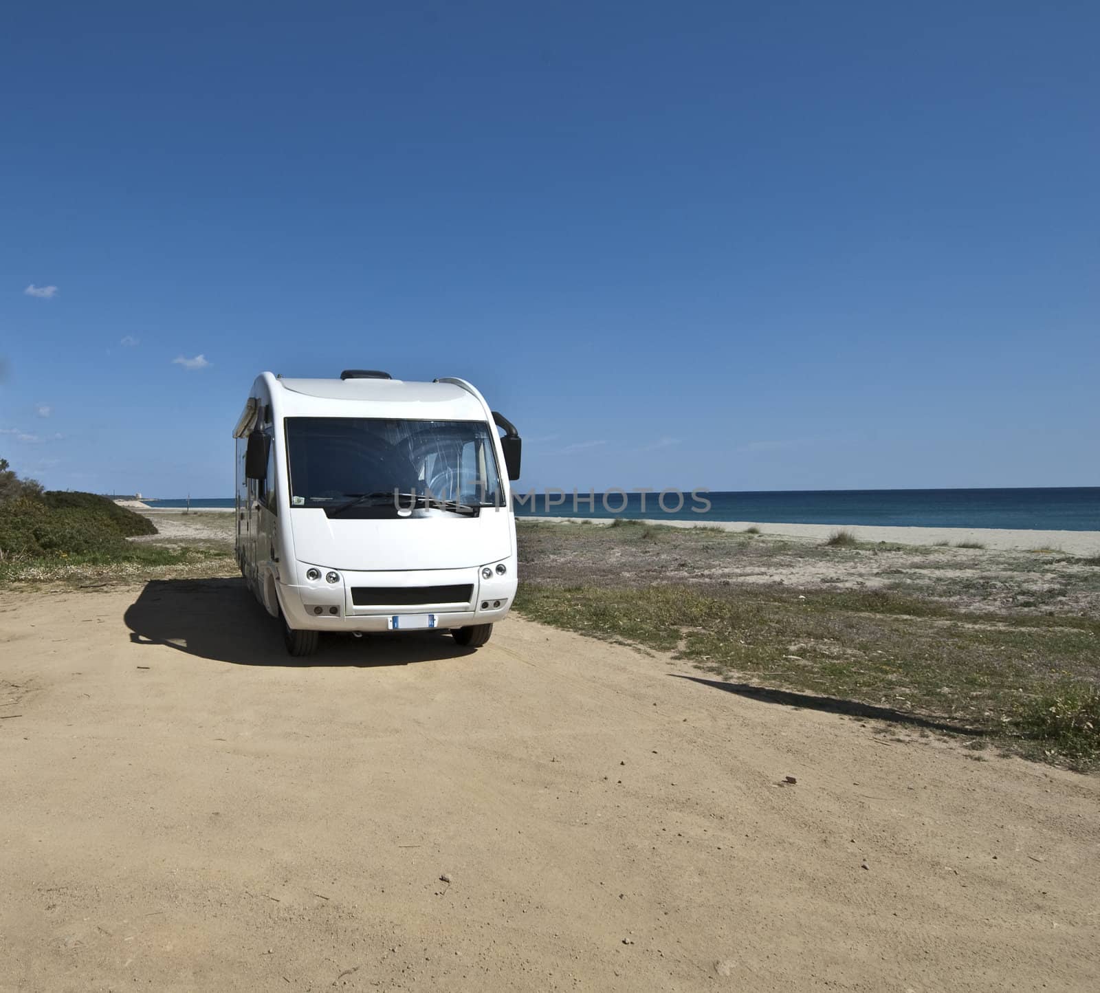 camper parked on a beach in Sardinia