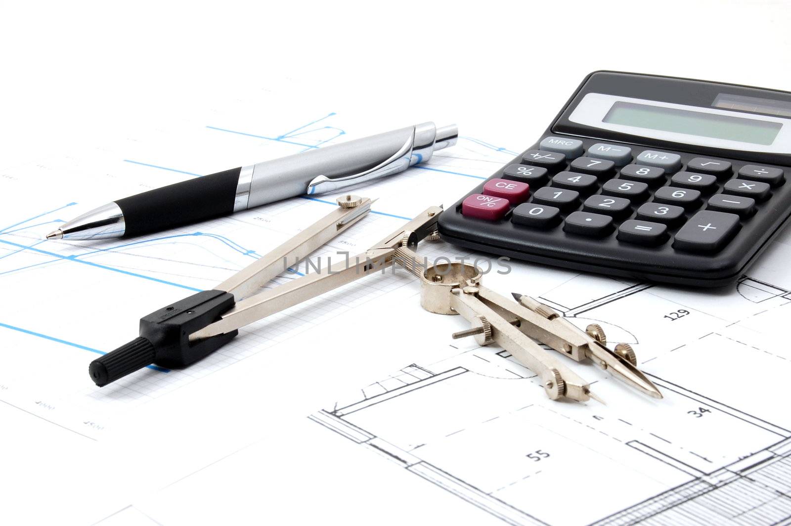 architecture or business still life with plans as background