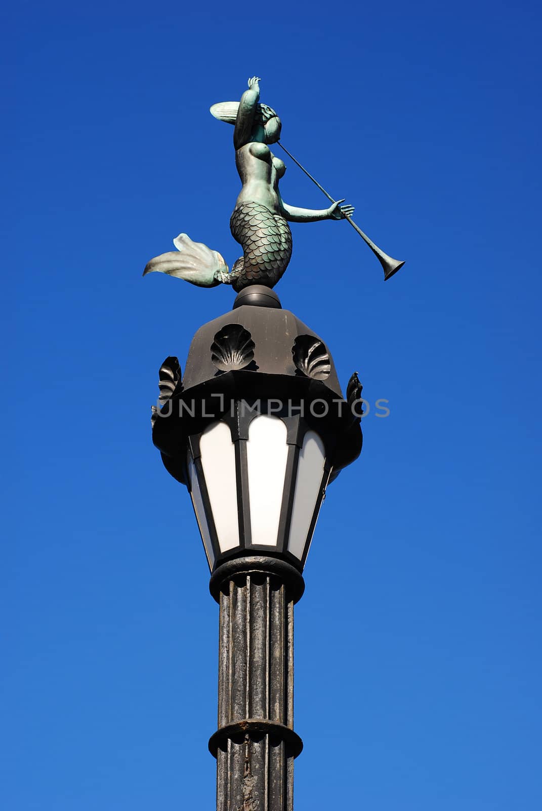 Old lamp post with mermaid, Saint Petersburg, Russia