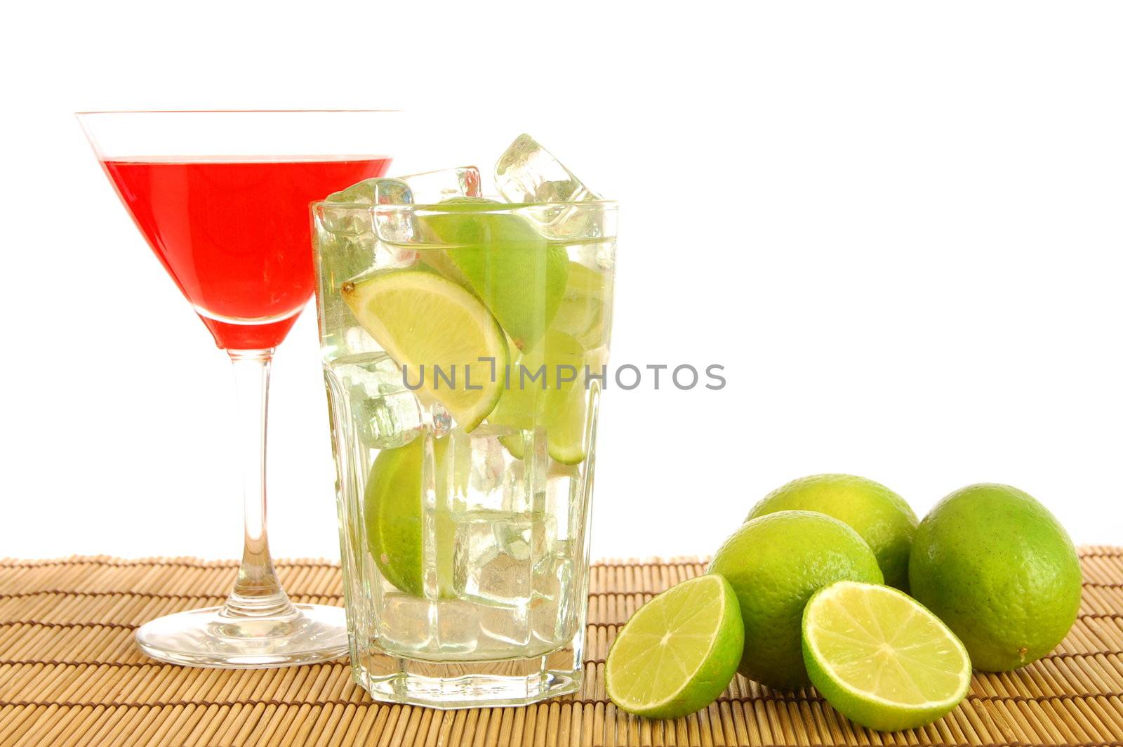 green and red cocktail with lime and copyspace