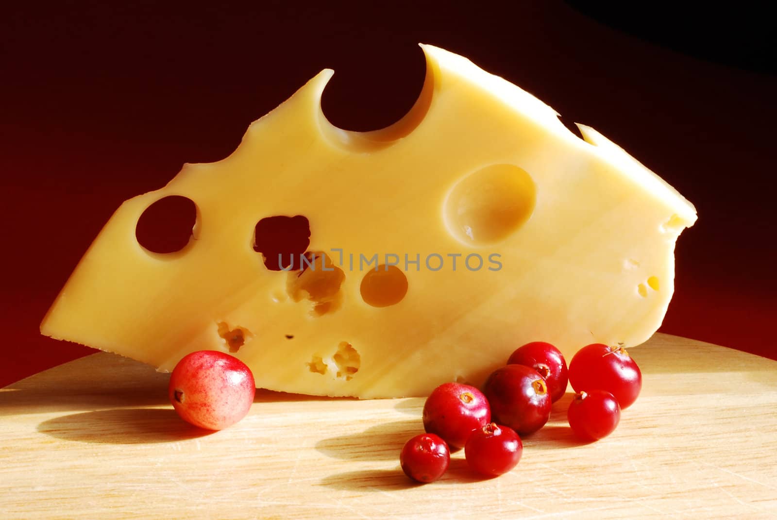 Pies of cheese on a black background