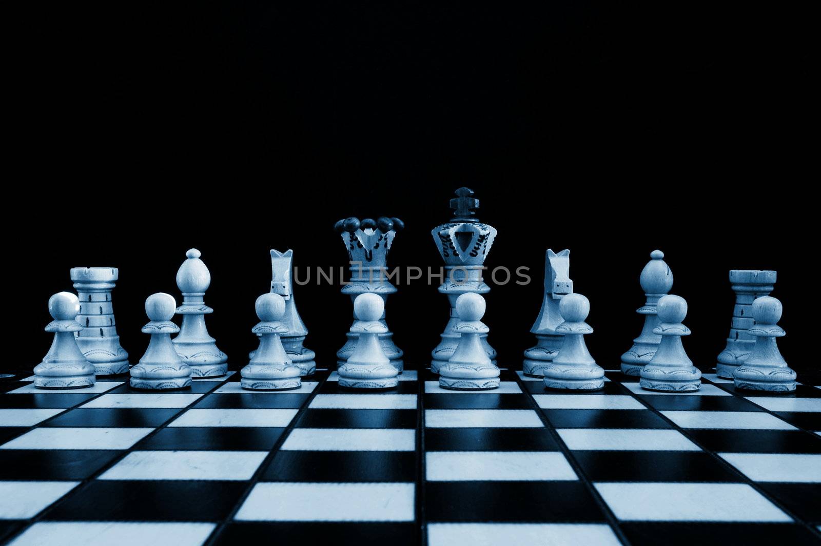 chess pieces showing power competition conflict and strategy in business