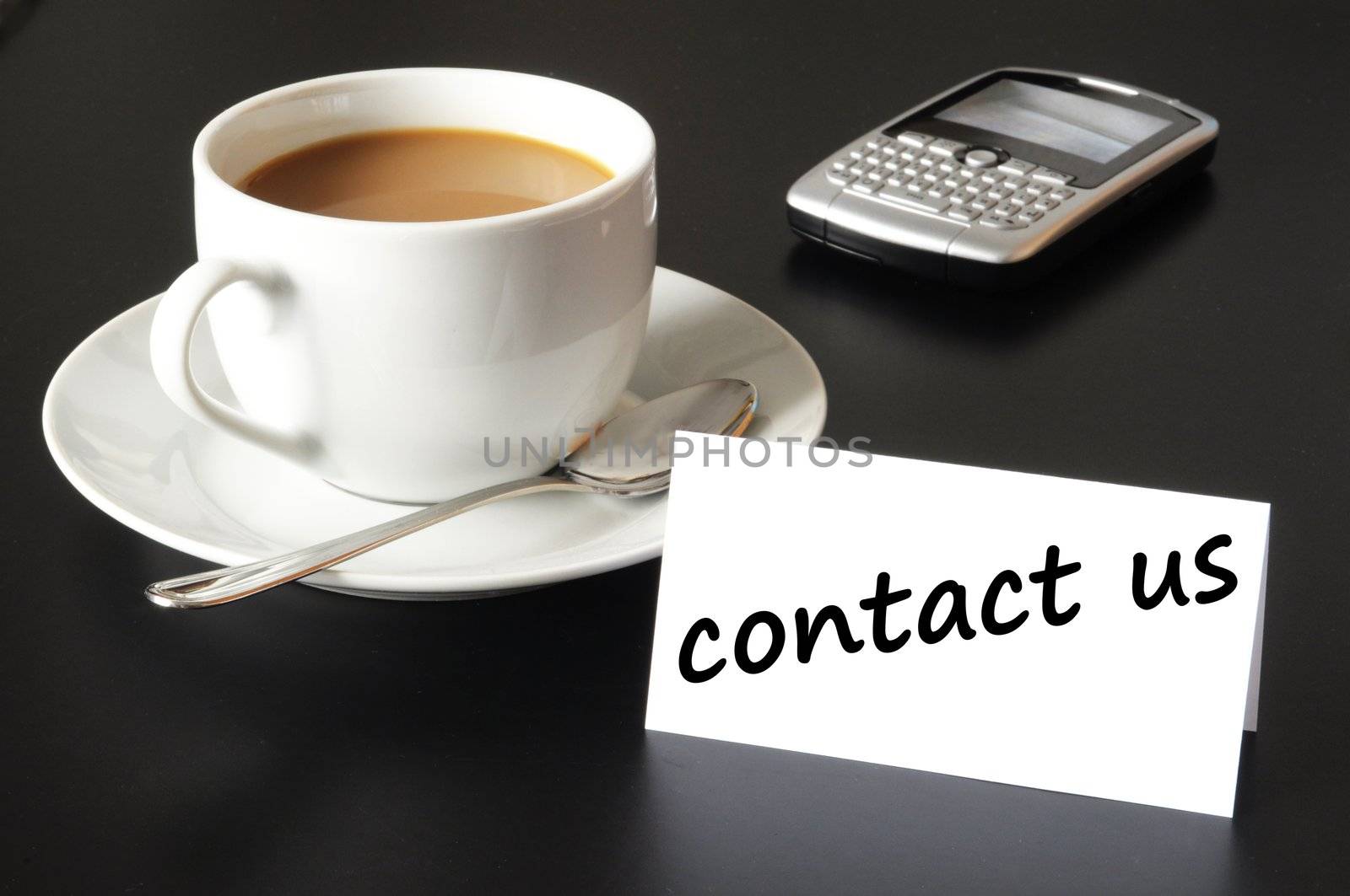 contact us and coffee cup showing business support concept