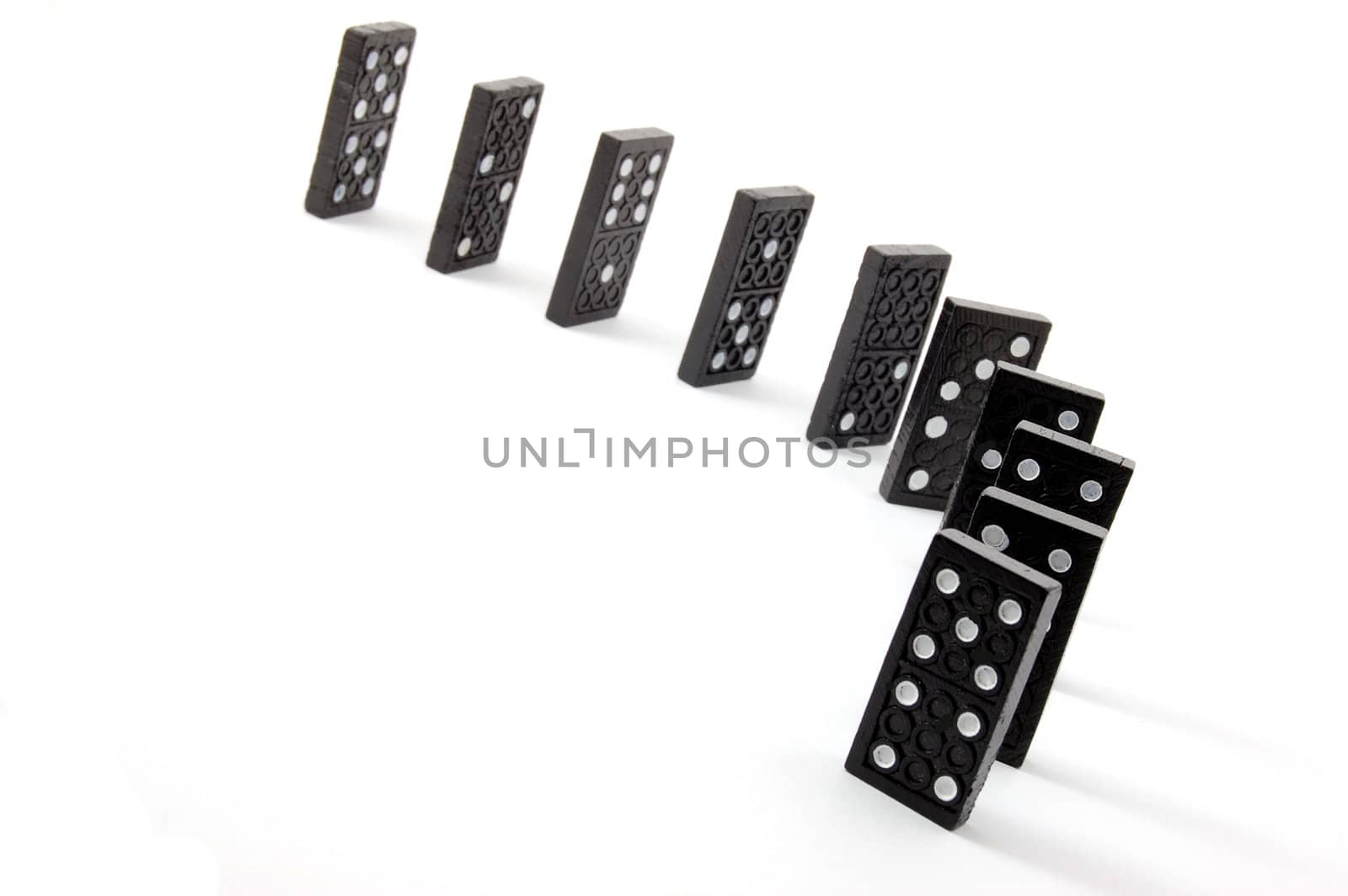 chain of dominoes isolated on a white background