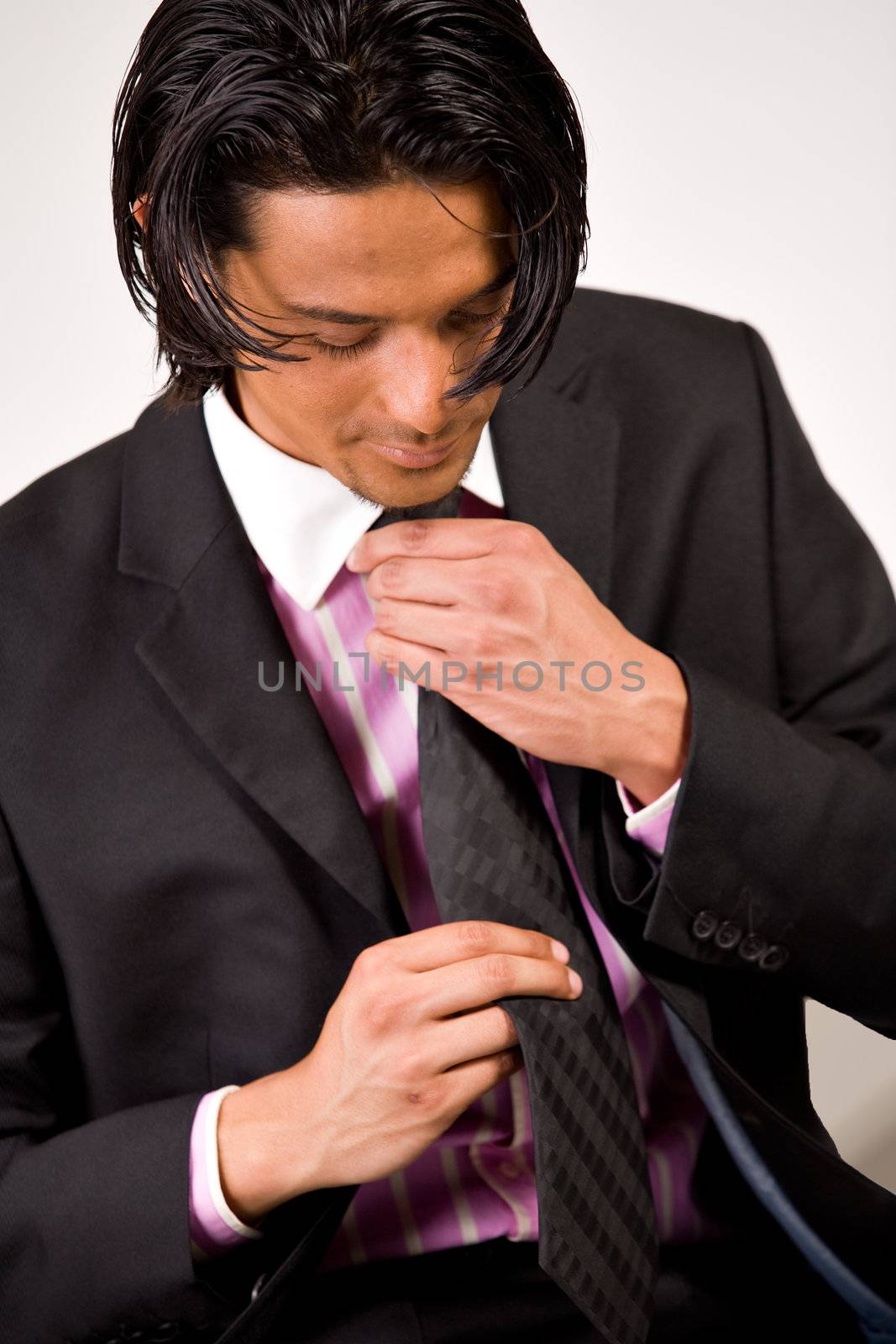 Young indonesian man in a business suit