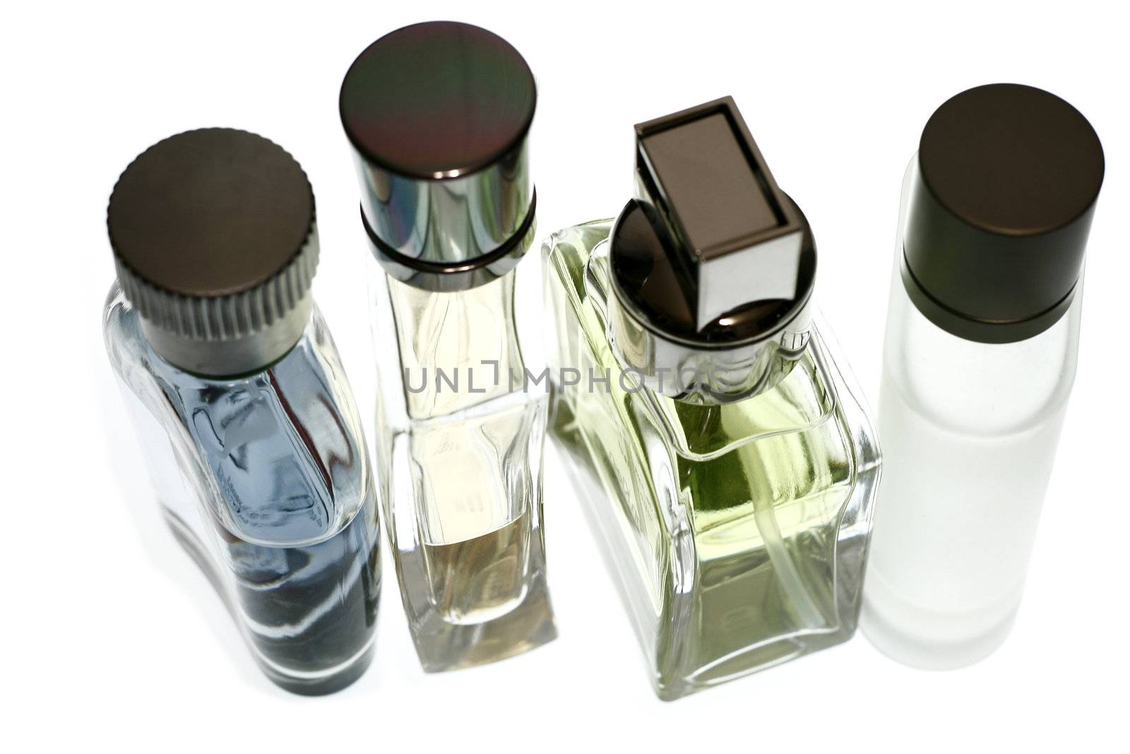 Mens Perfume and fragrances isolated in white