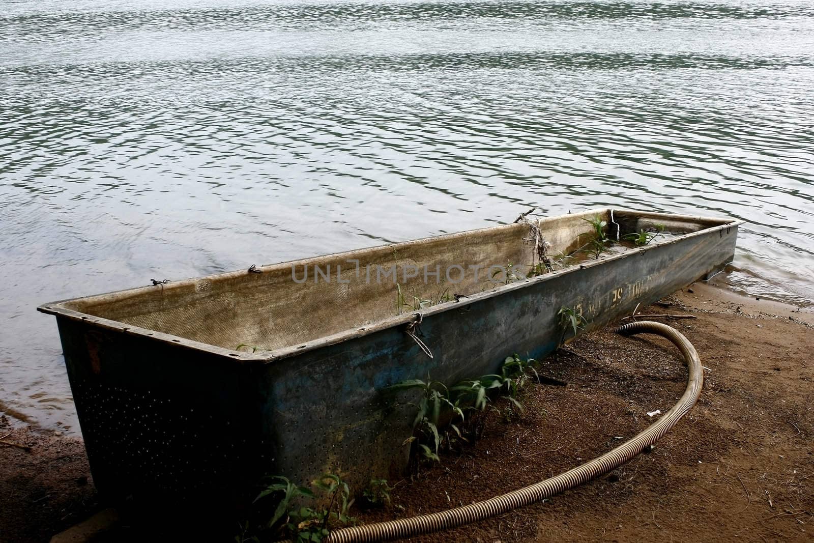 Wreckage in Lake Gwachon in South Korea with mountain