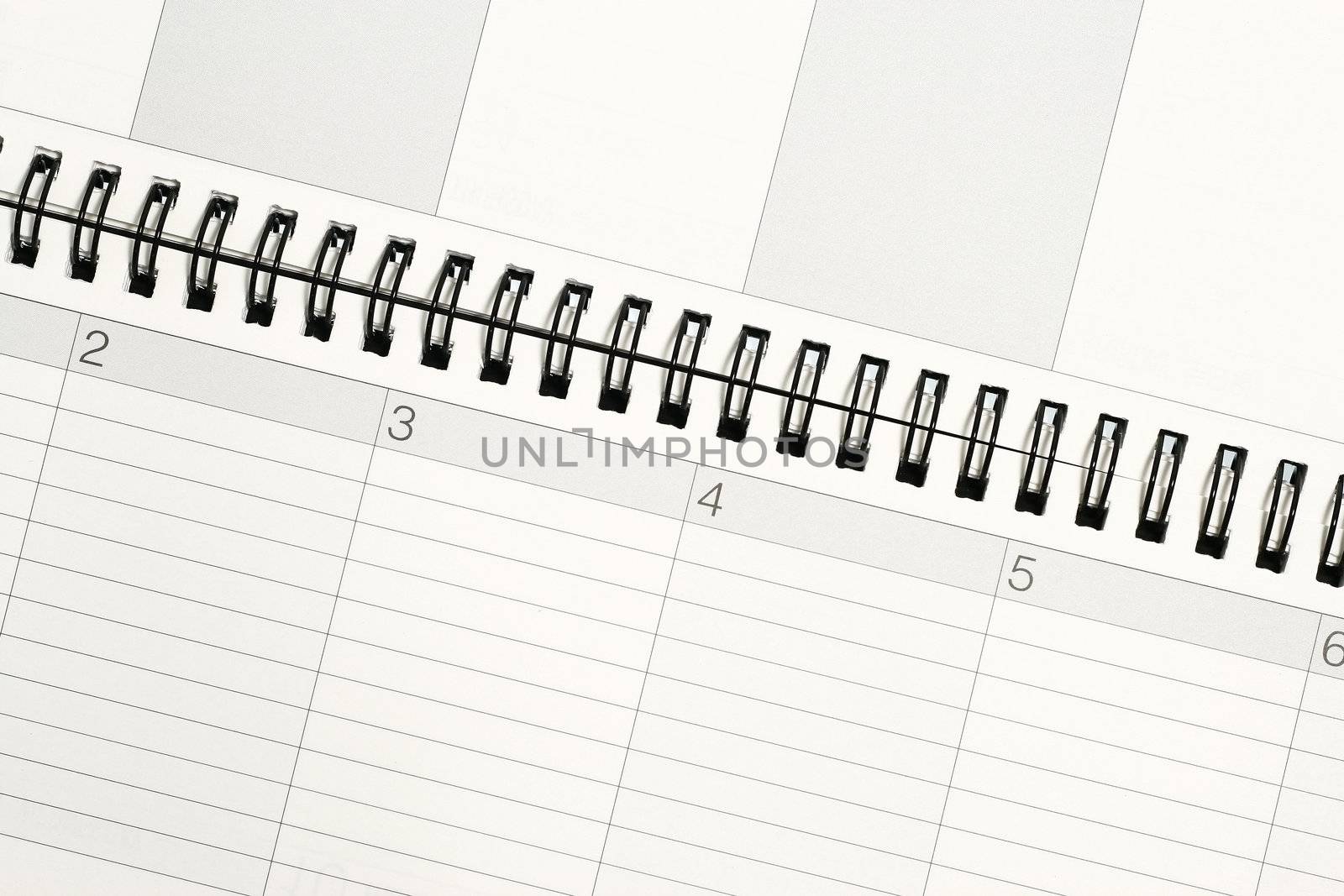 Open Spiral Notebook with  dated and calendar concept