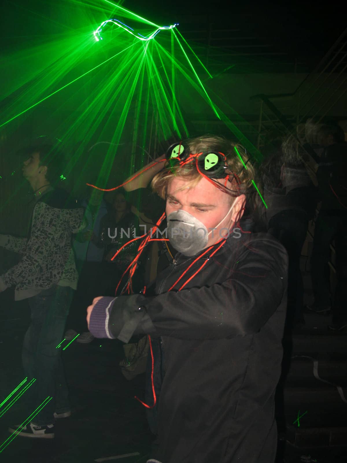 Dancing boy in a gas mask