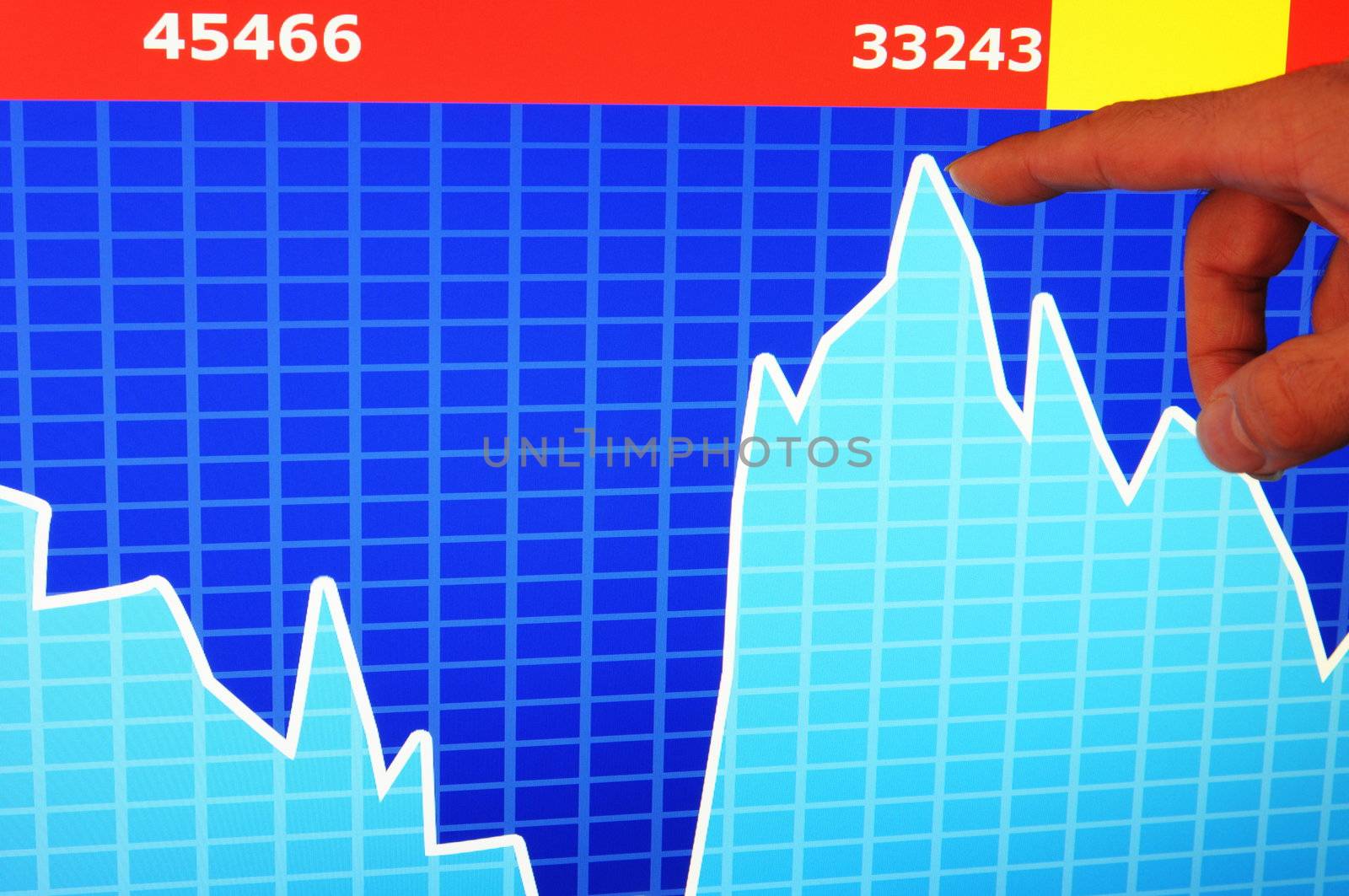 financial stock market concept with hand and computer lcd display