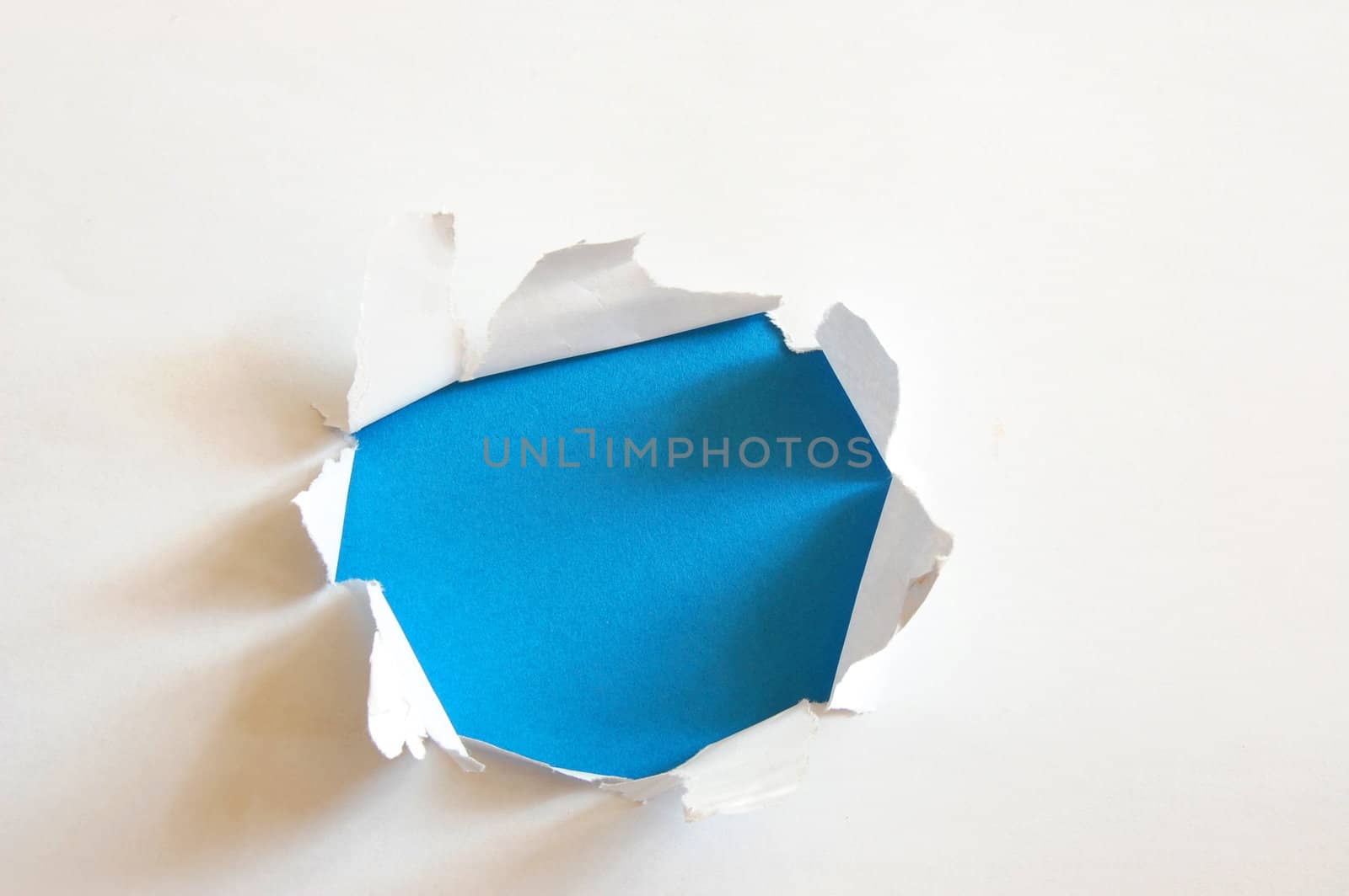 blue hole with copyspace in blank and empty sheet paper