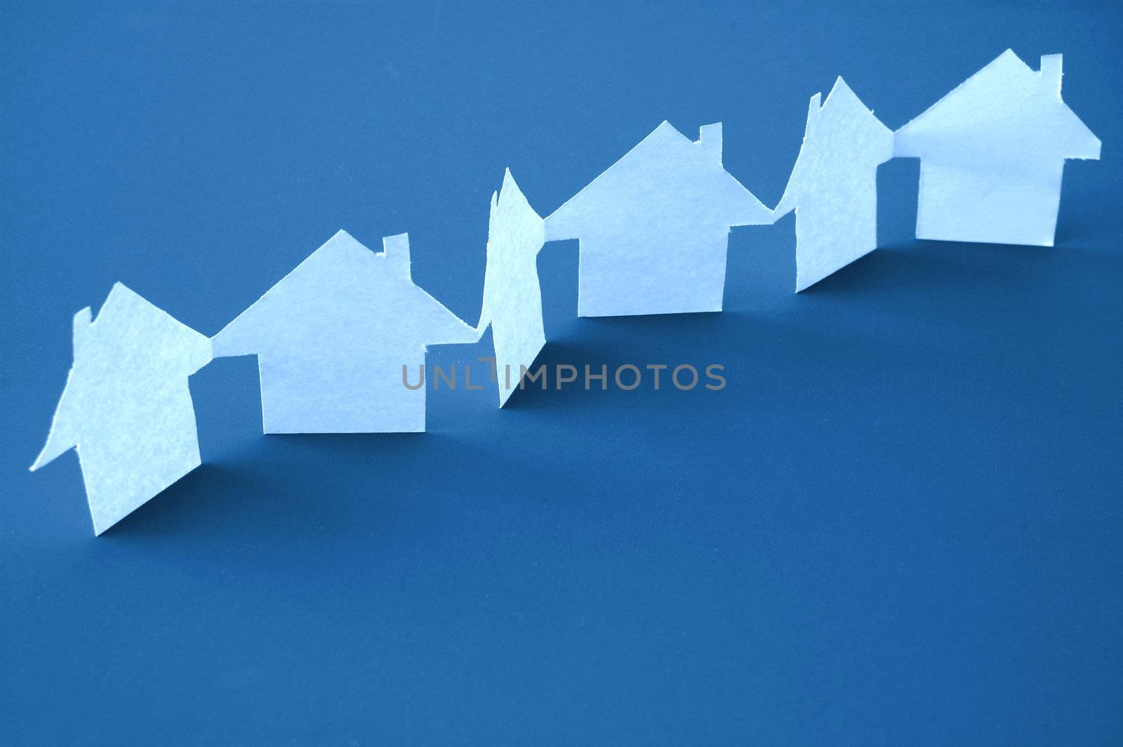 paper houses or homes showing a concept for real estate