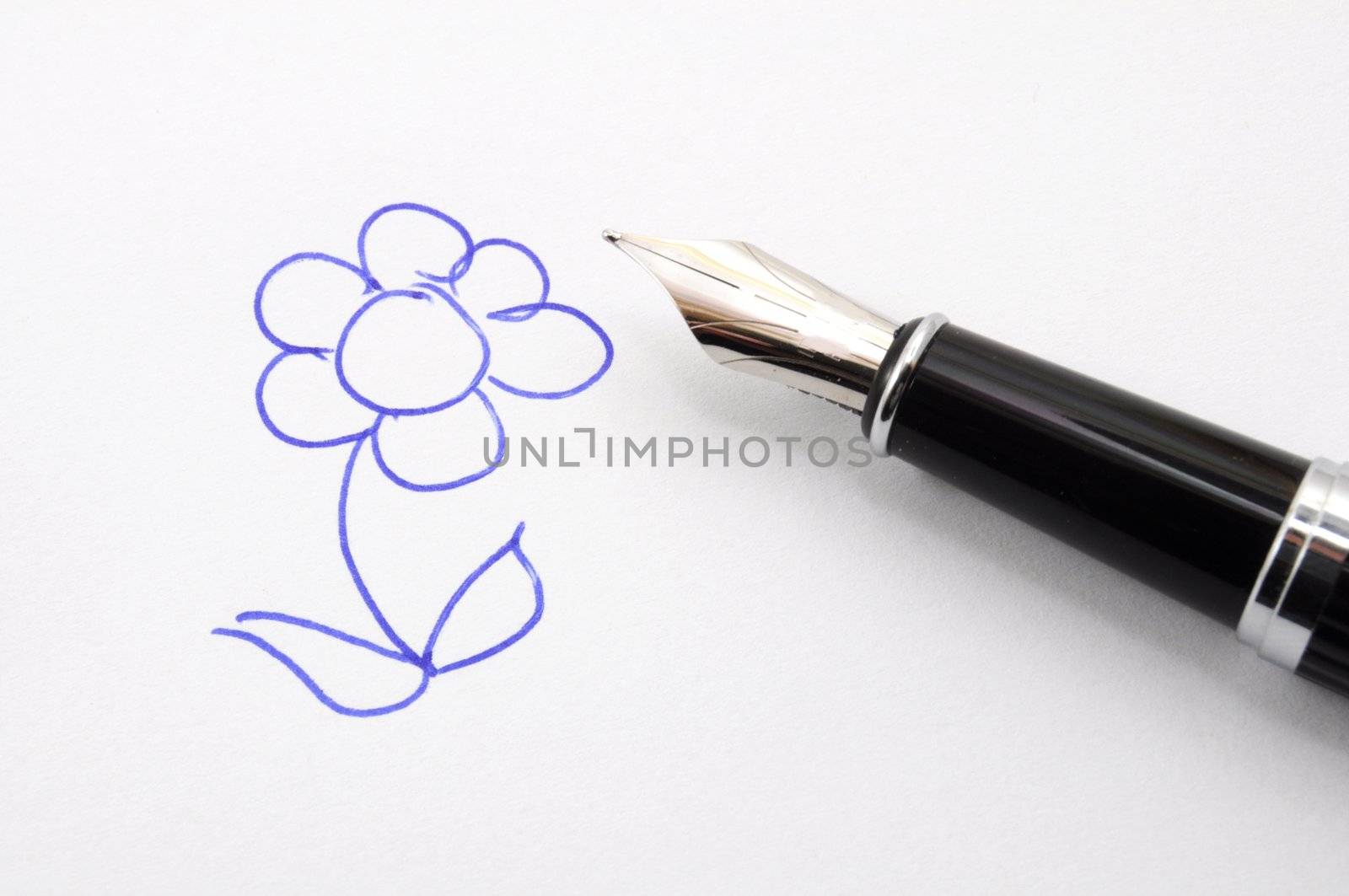 illustration of an flower on paper with a pen