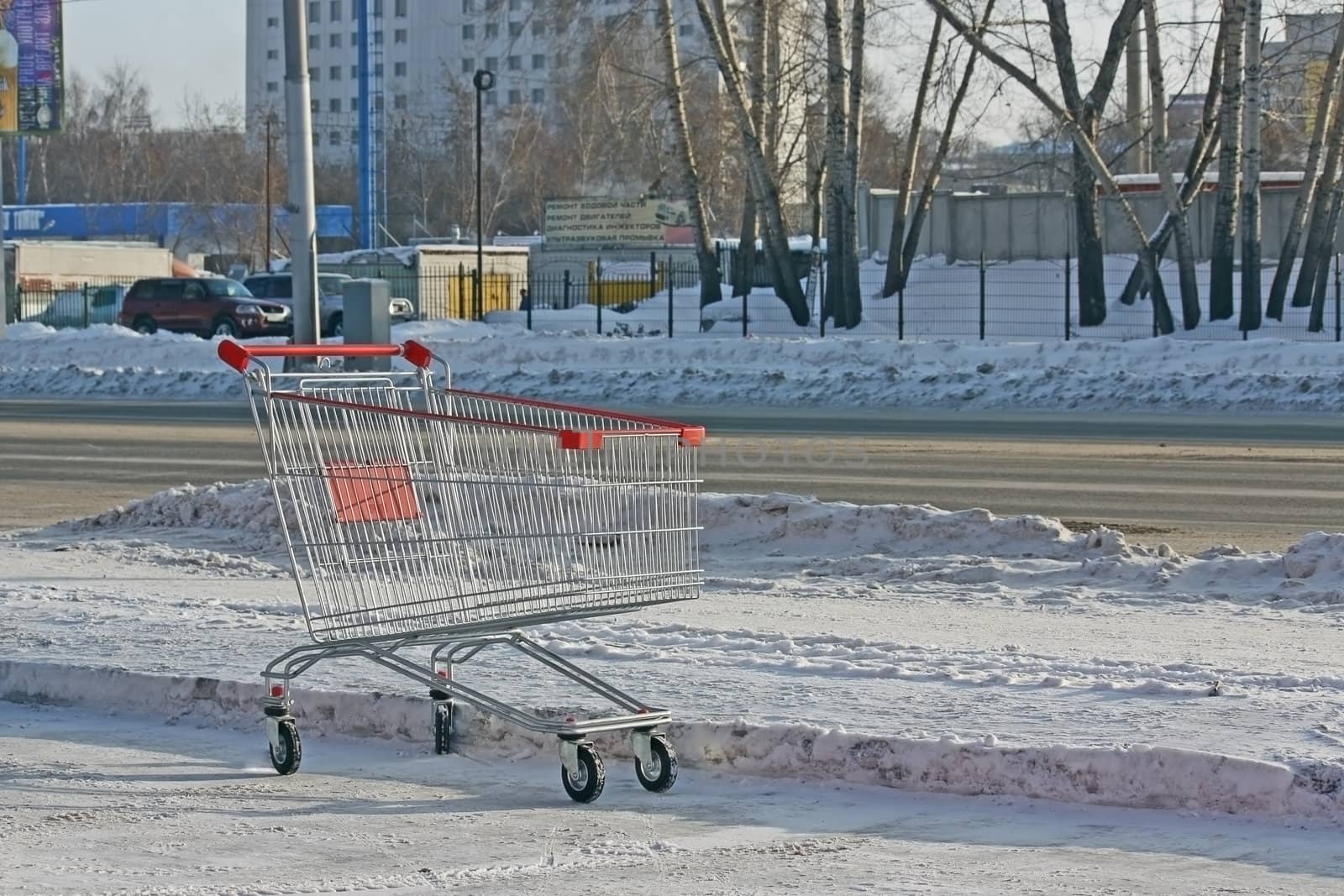 The street is empty trolley for products from the store.