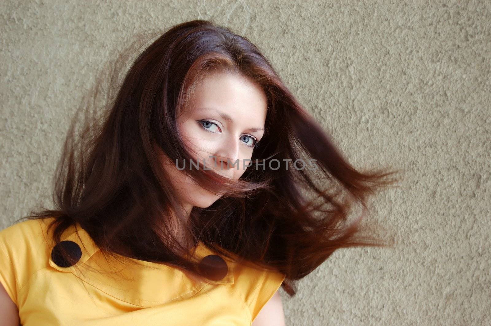 attractive young girl with flying hair