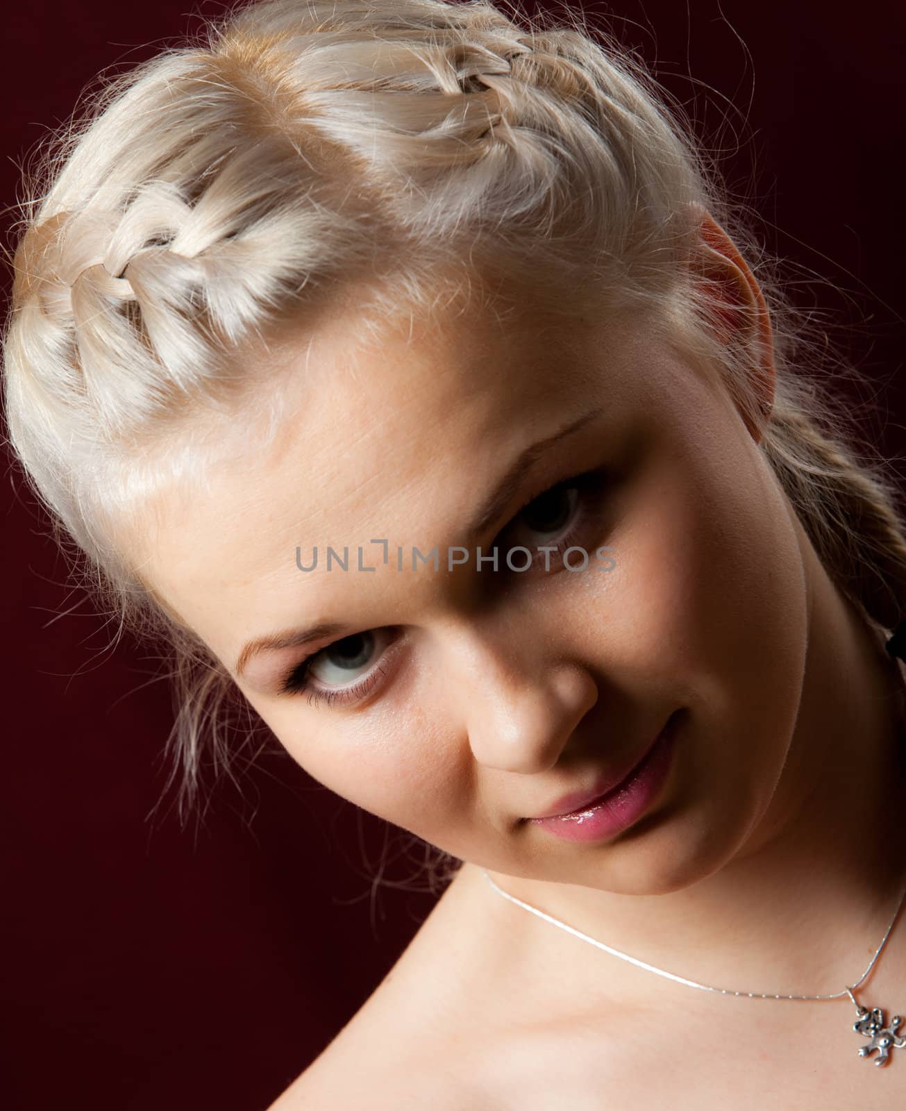 Portrait young beautiful girl on dark background