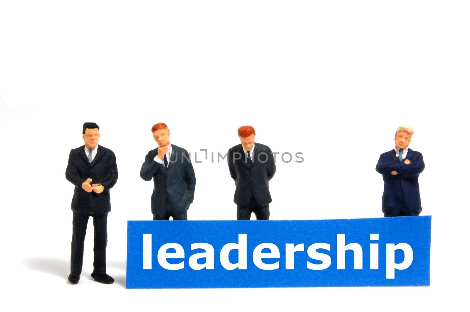 leadership or leader concept with business man and board isolated on white background