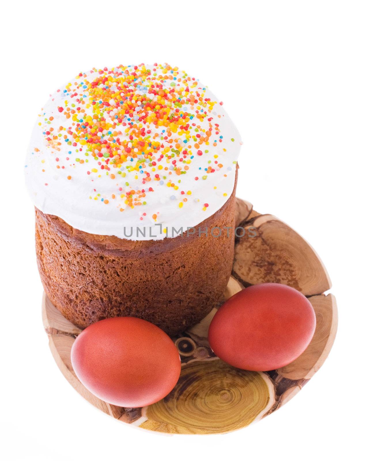 Easter cake and painted egg isolated over white background