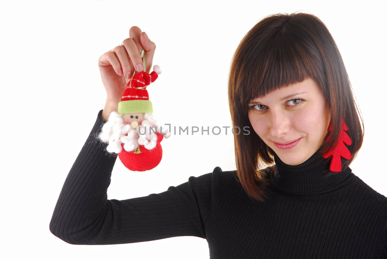 Young woman with new year tree as ear ring