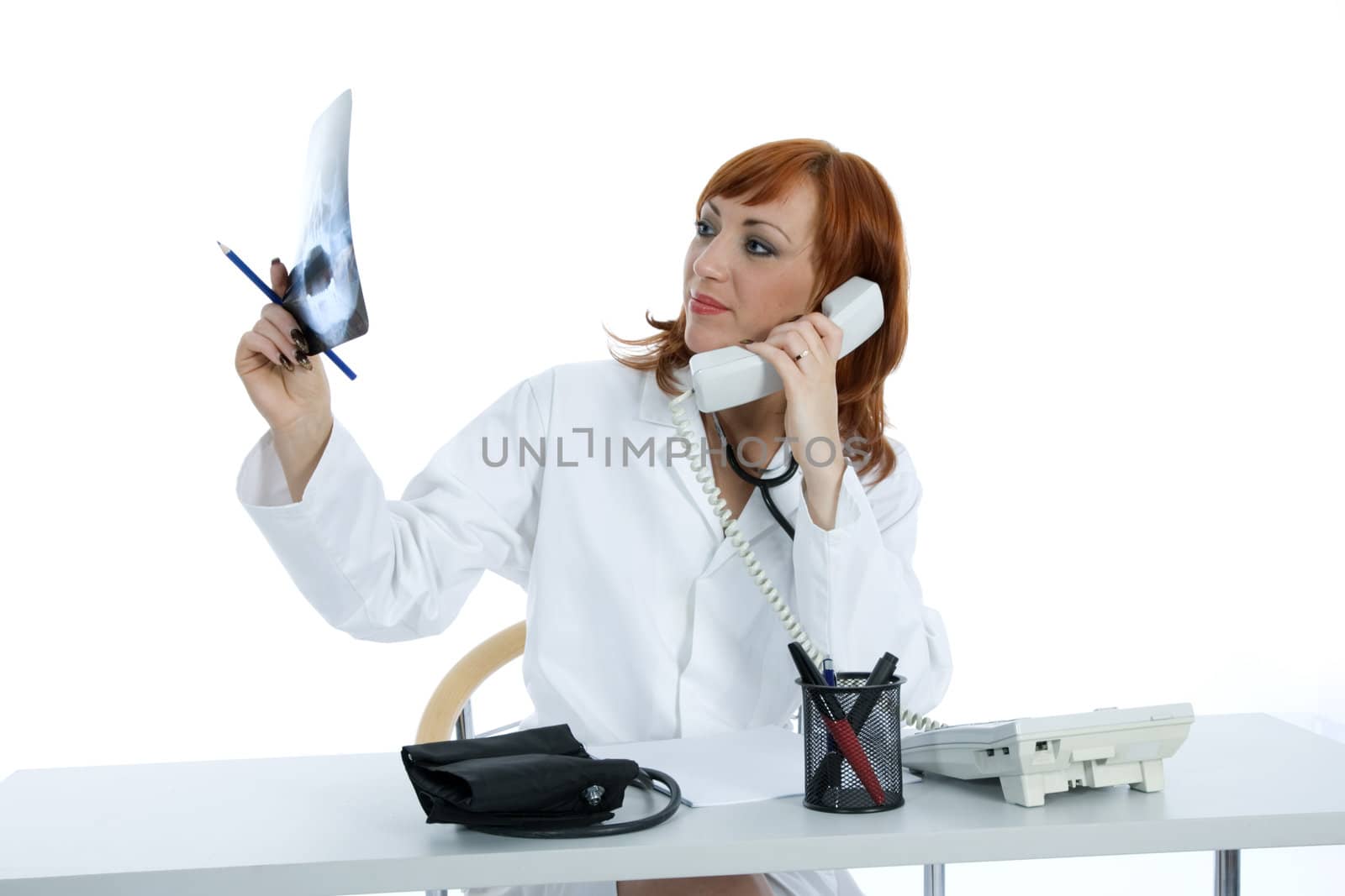 young doctor with stethoscope on isolated background
