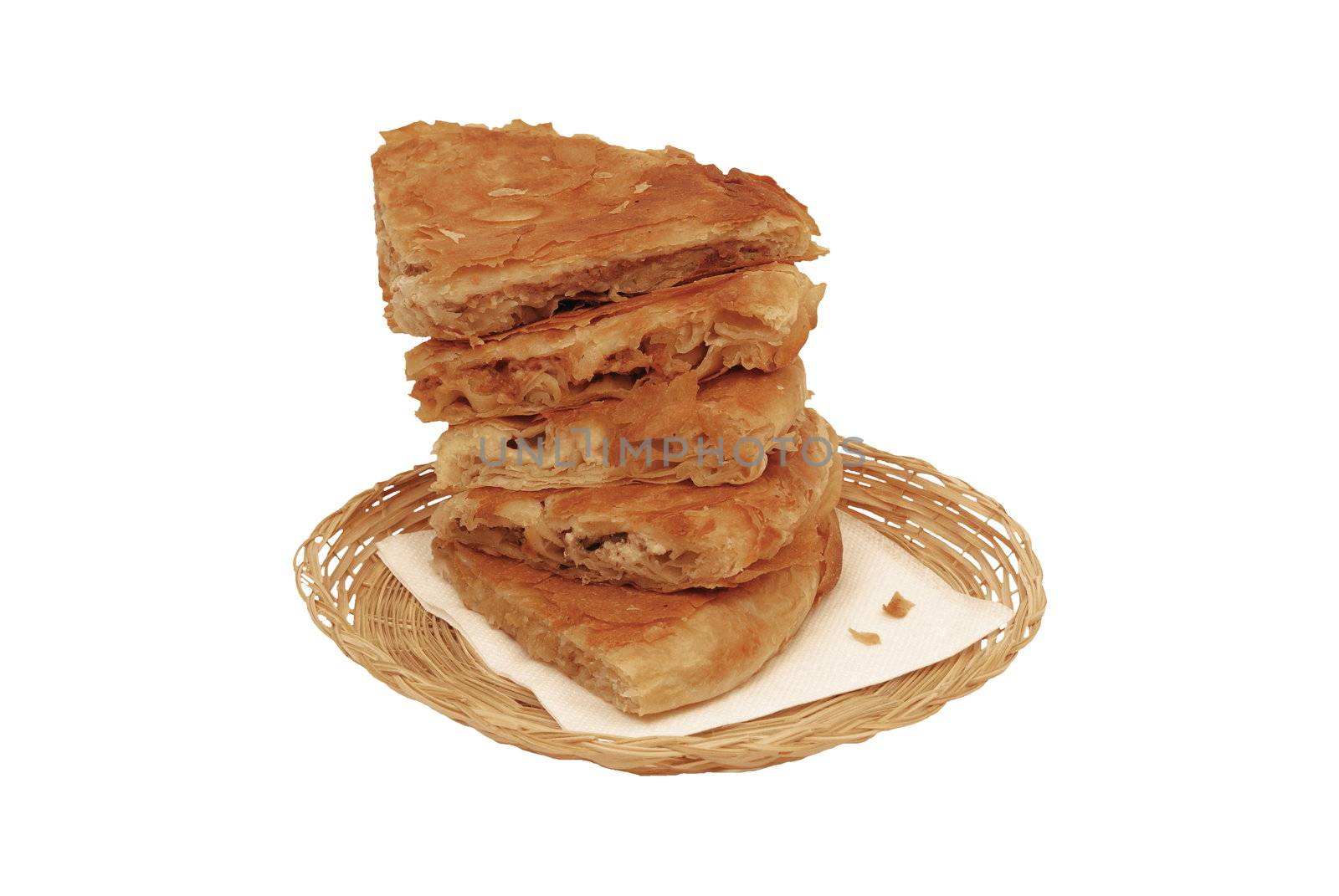 Round burek in the basket isolated over white background