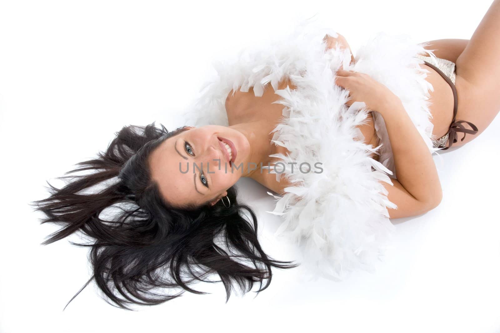 portrait of the brunette with blue eye on white background