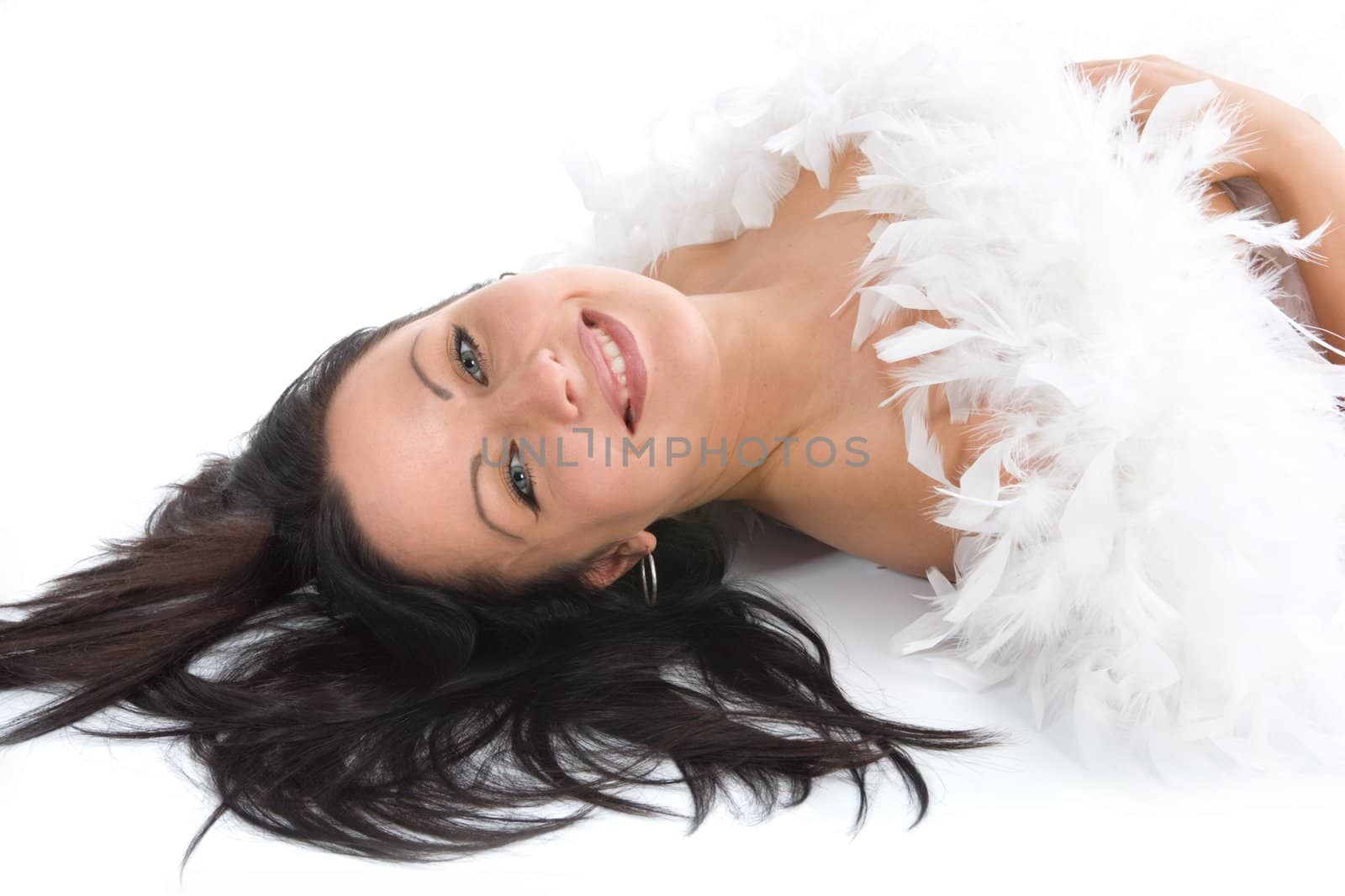 portrait of the brunette with blue eye on white background