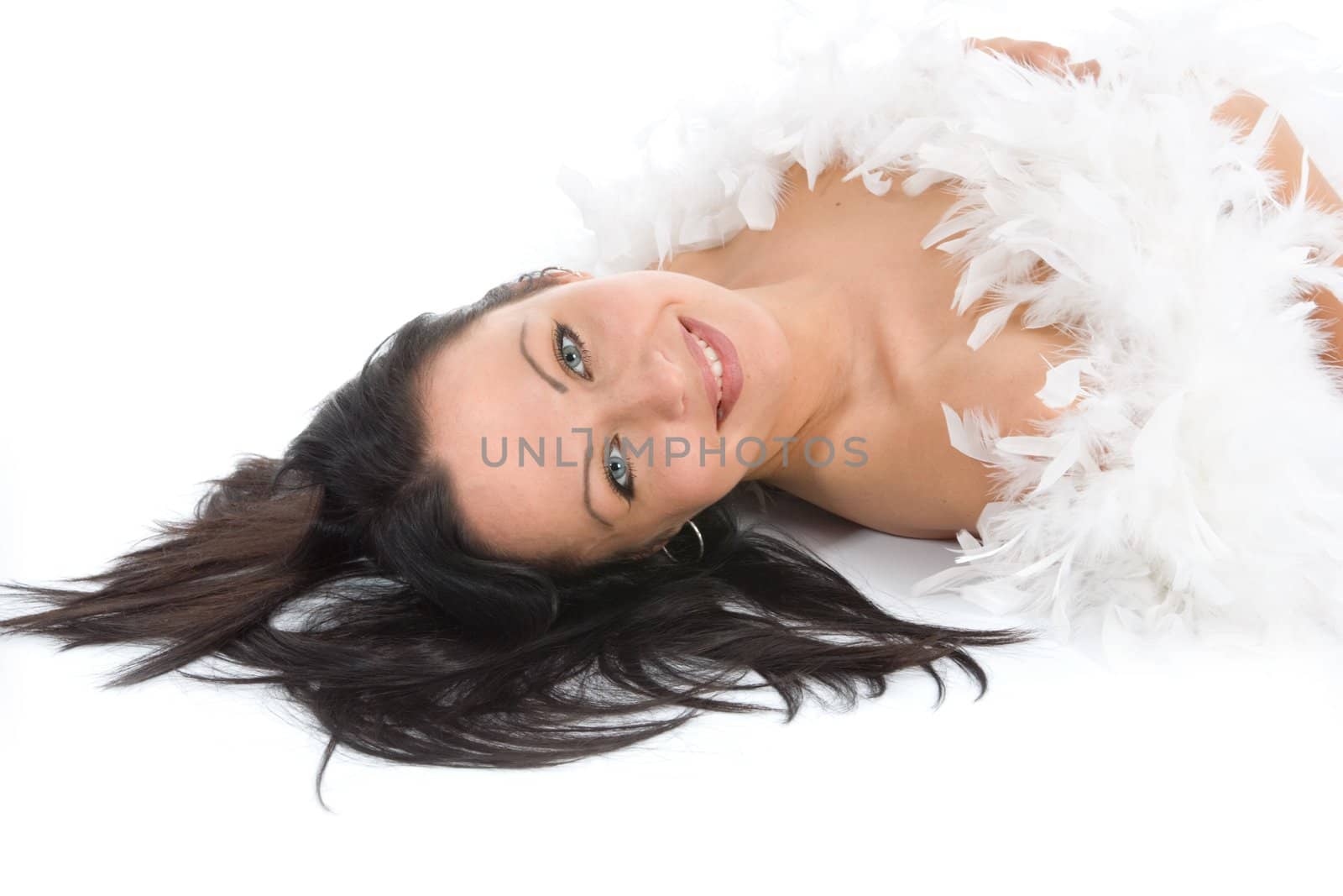 portrait of the brunette with blue eye on white background