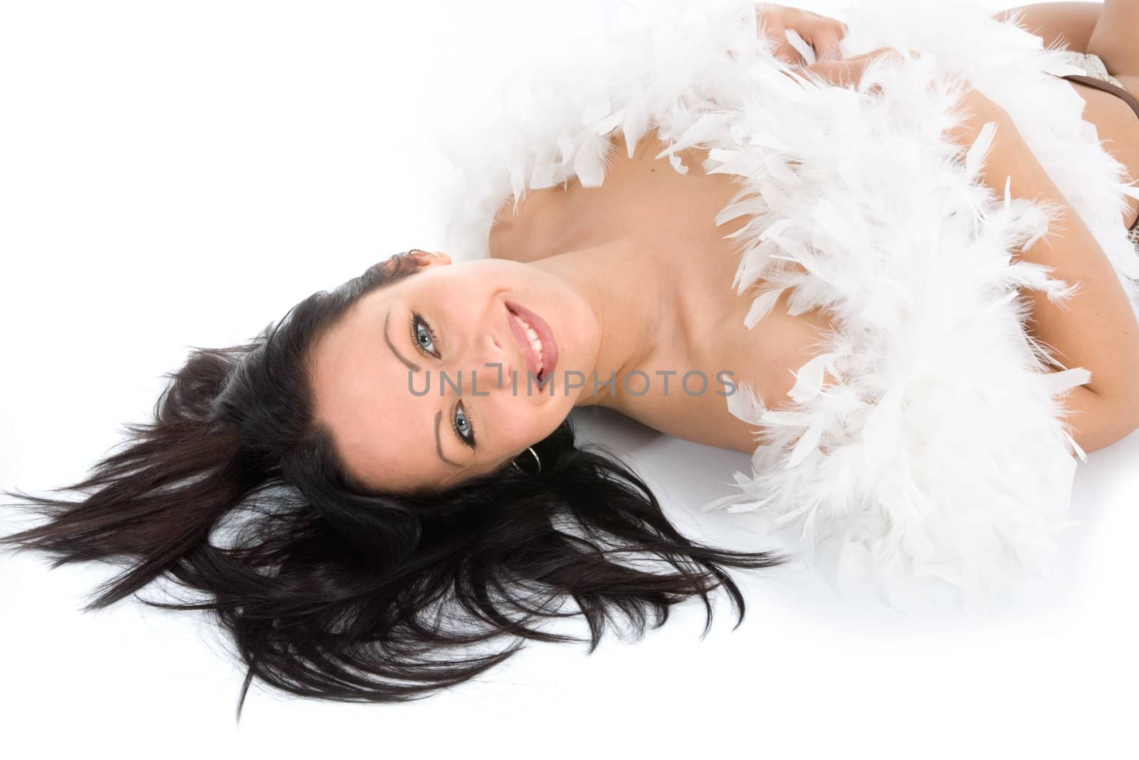 portrait of the brunette with blue eye on white background