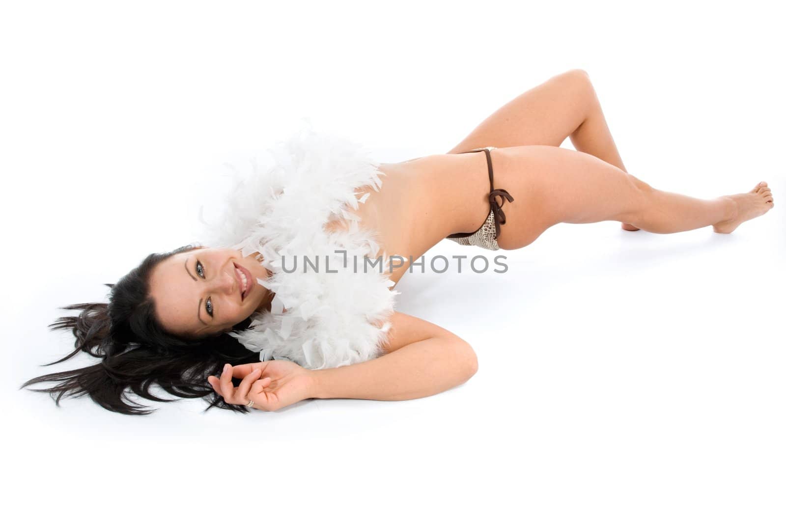 portrait of the brunette with blue eye on white background