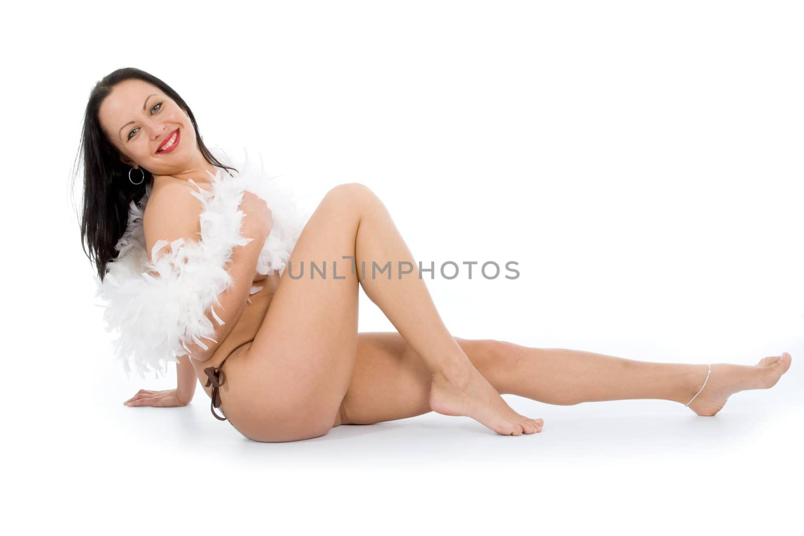 portrait of the brunette with blue eye on white background