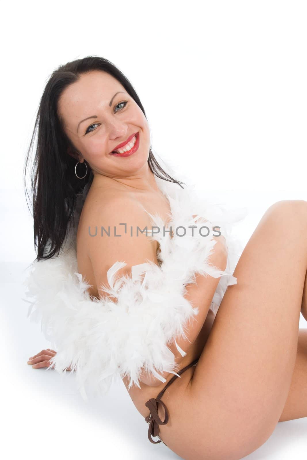 portrait of the brunette with blue eye on white background