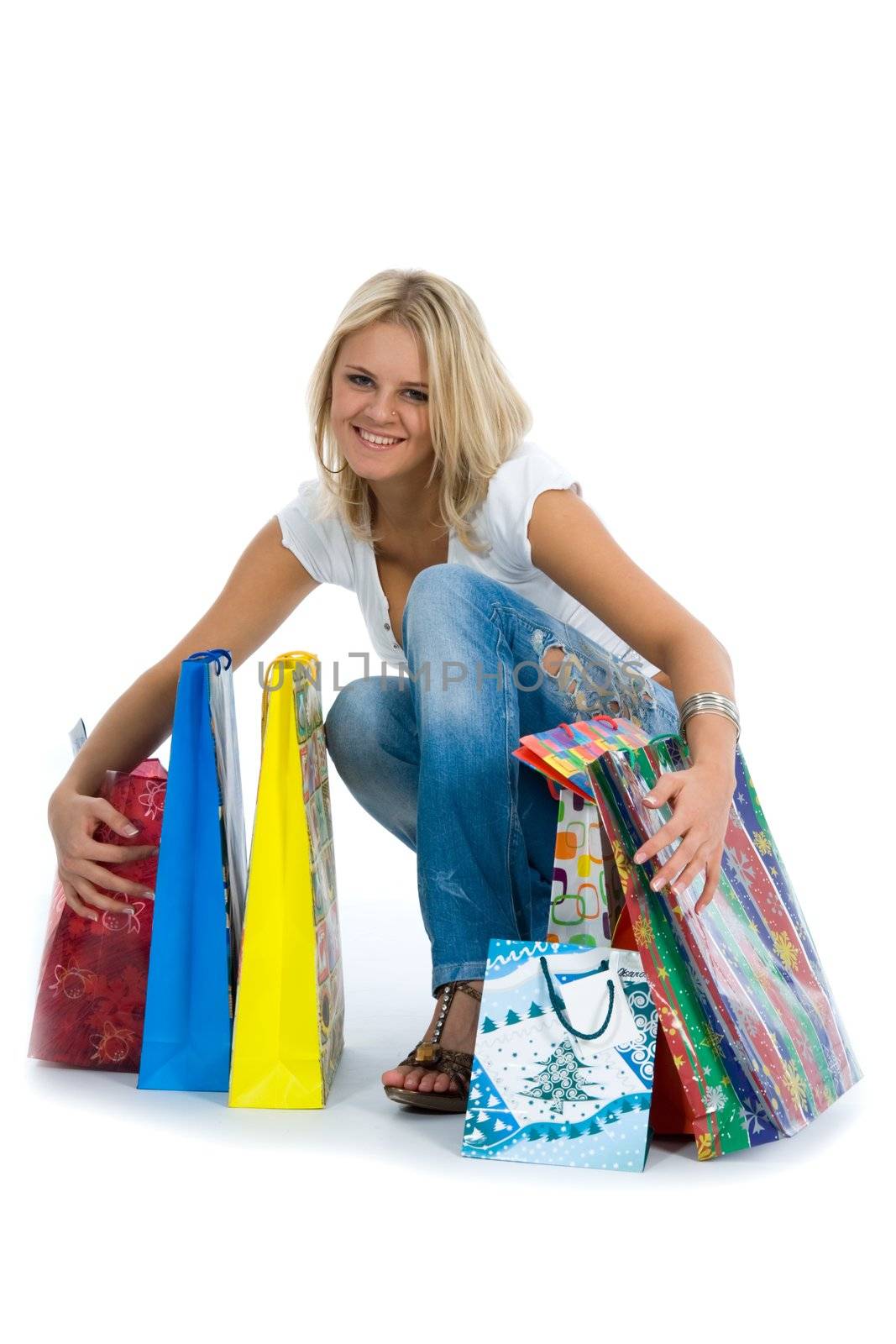 Beautiful woman with gift on white background