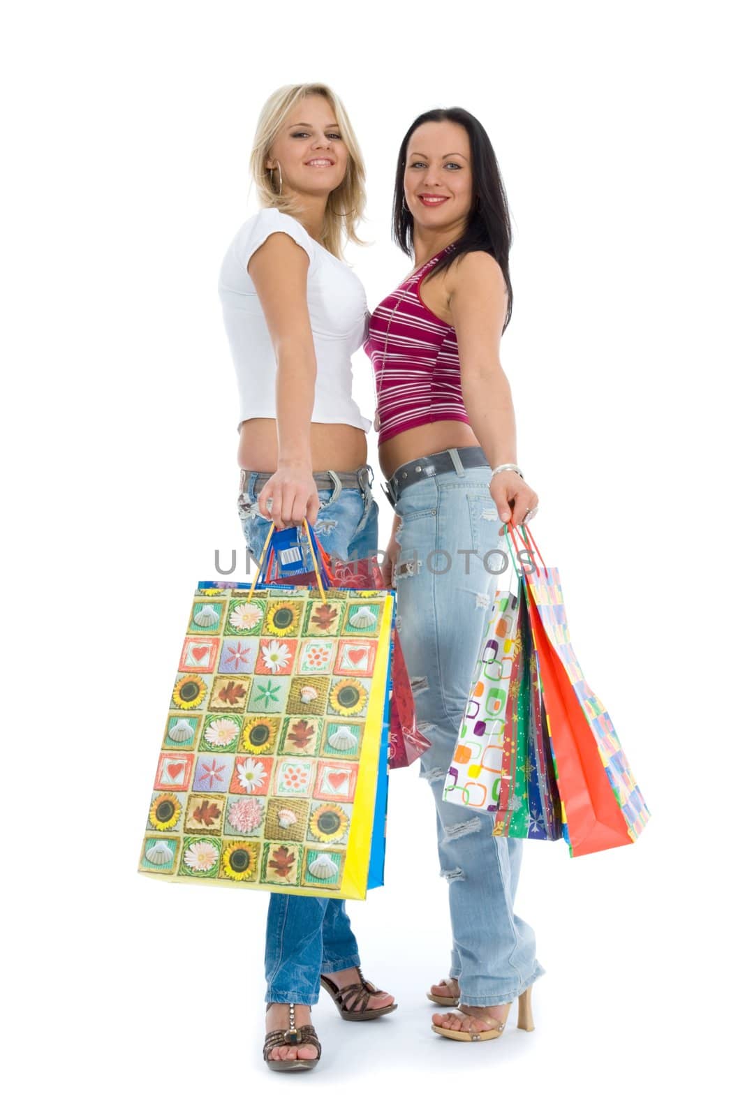 Beautiful women with gift on white background