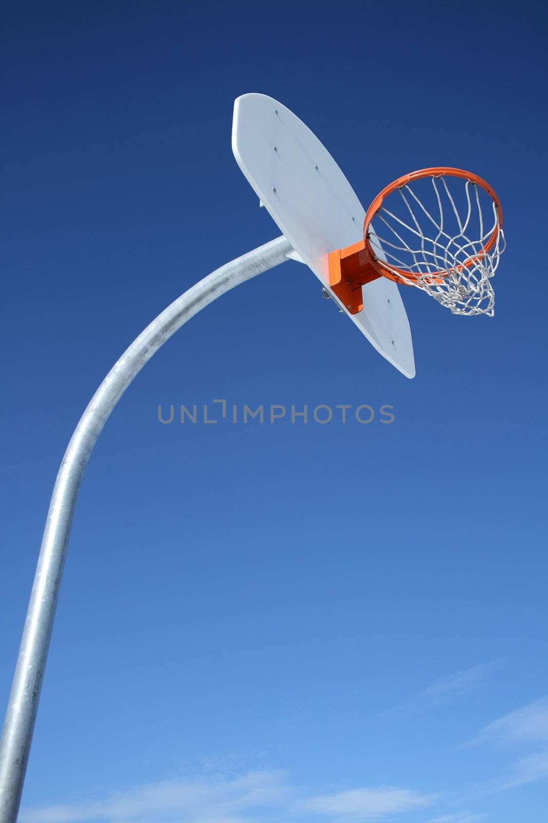 New basketball backboard and clear sky by anikasalsera